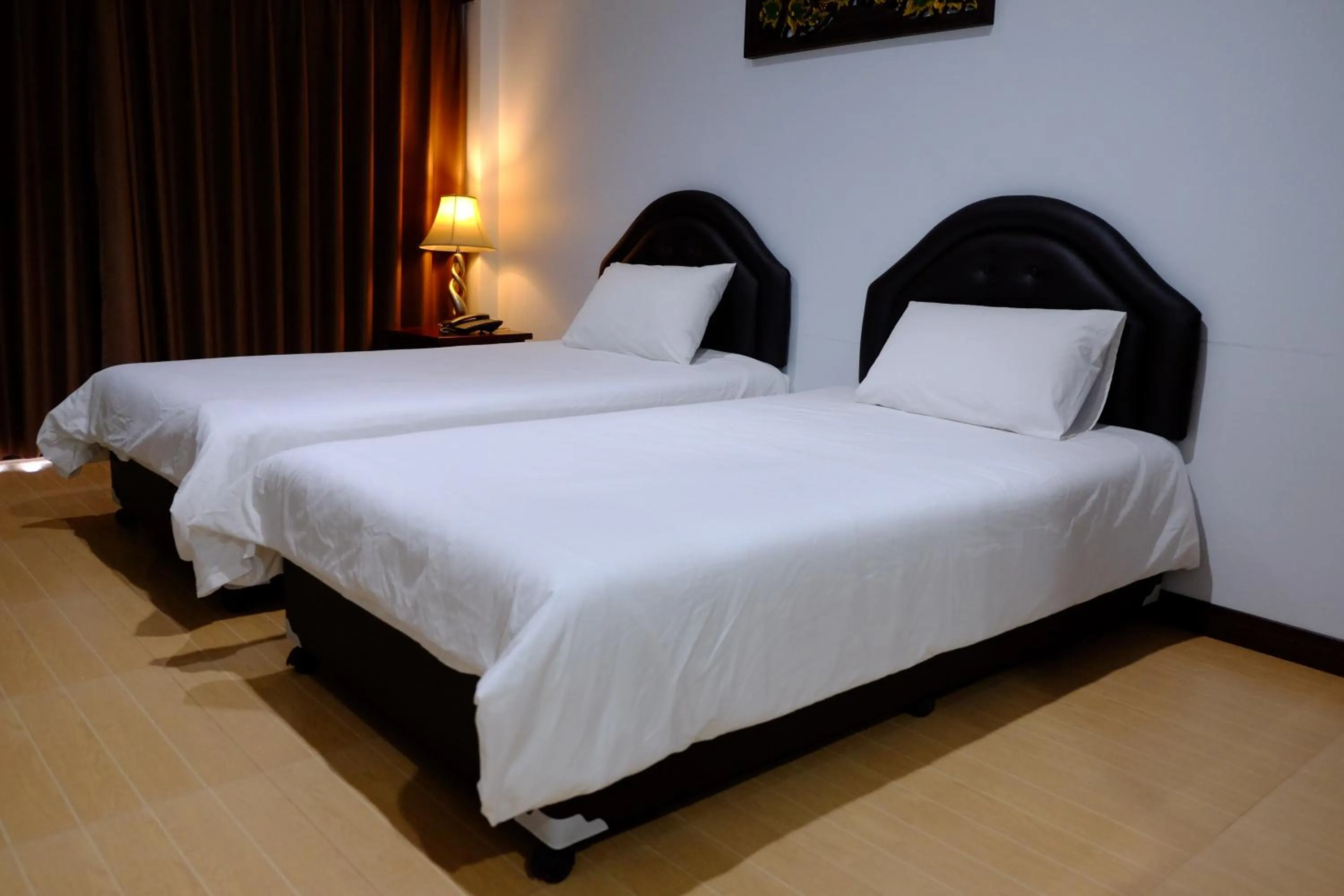Bed in Evergreen Resort Chanthaburi