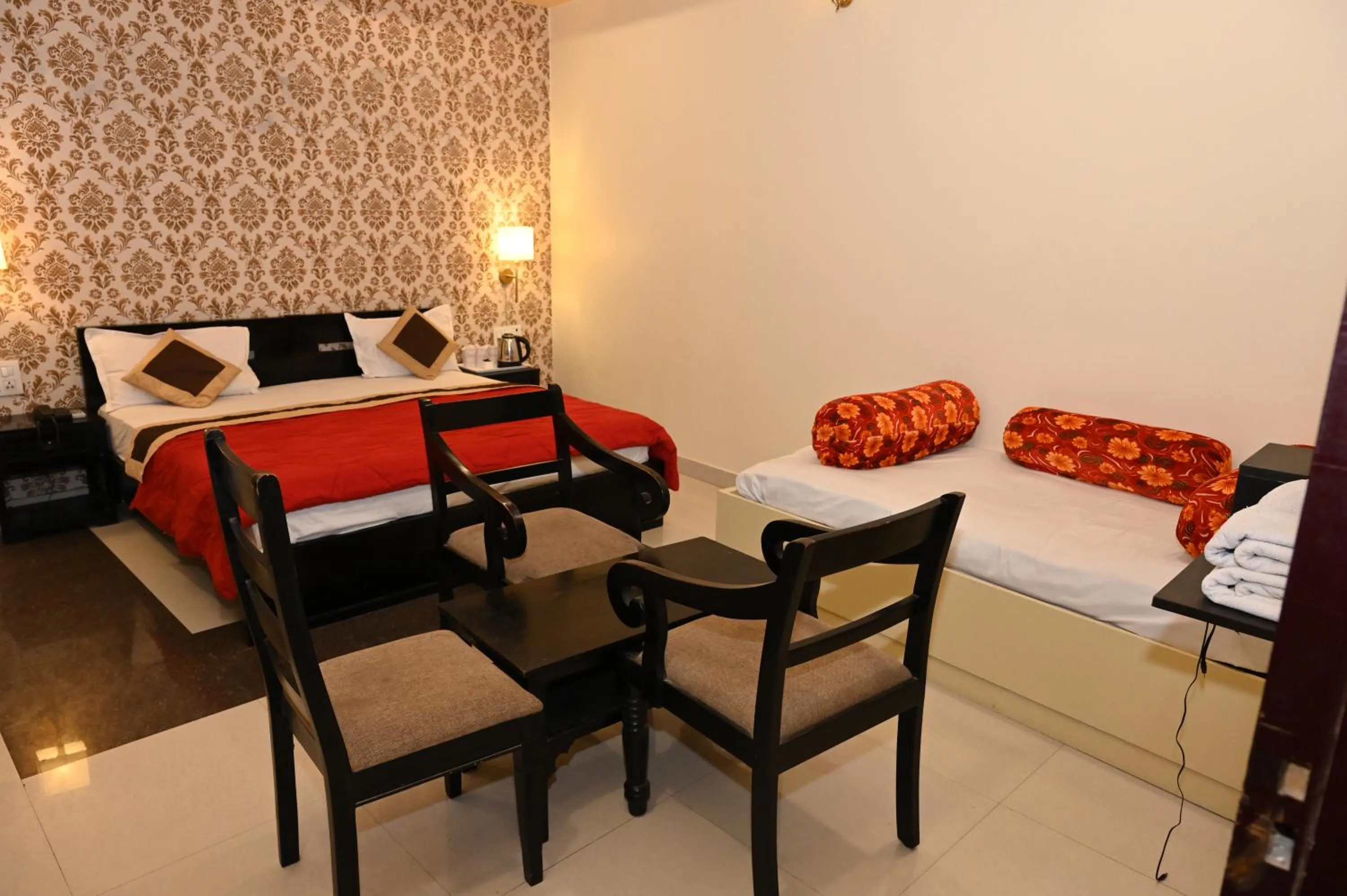 Bed in Om Heritage Haveli