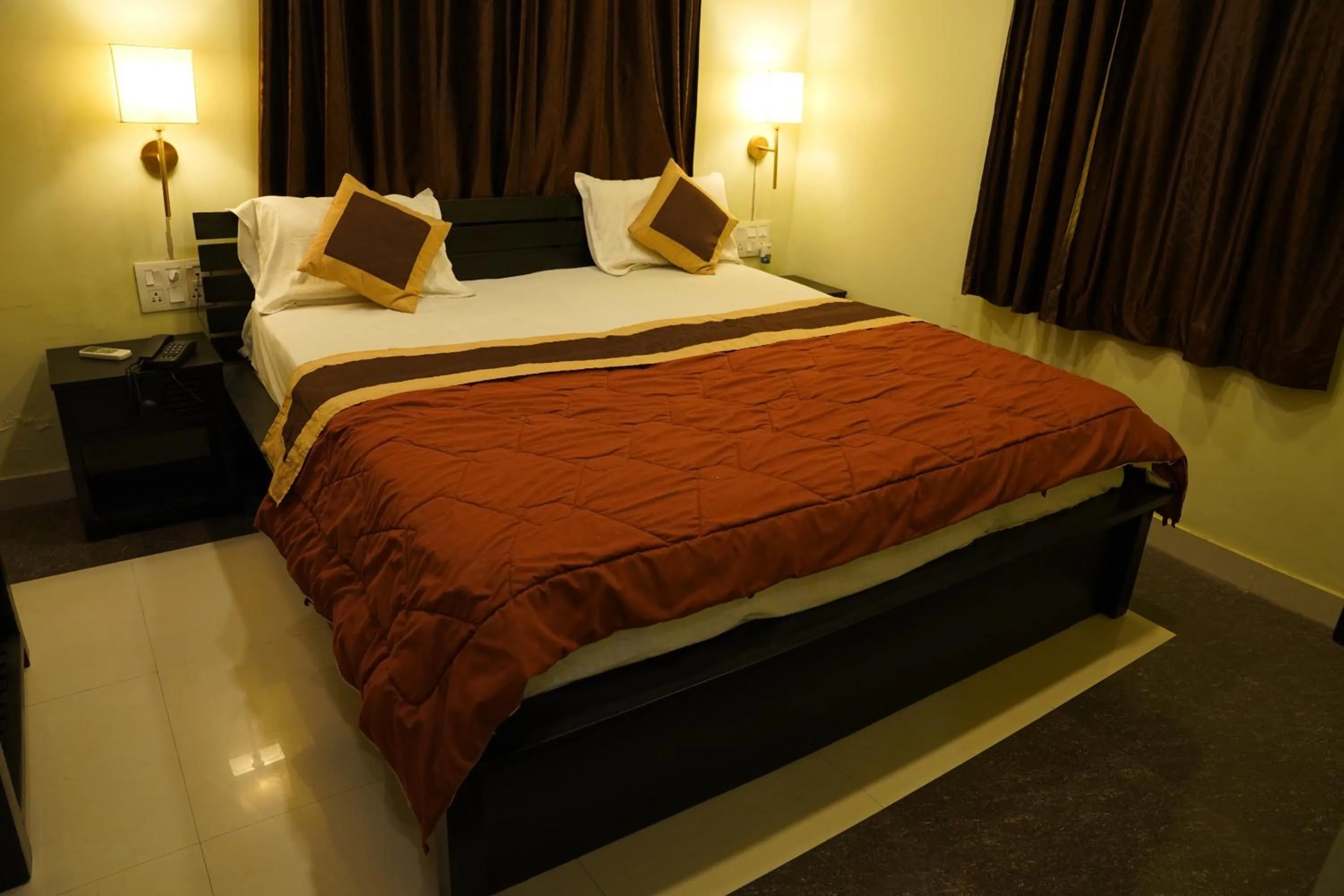 Bed in Om Heritage Haveli