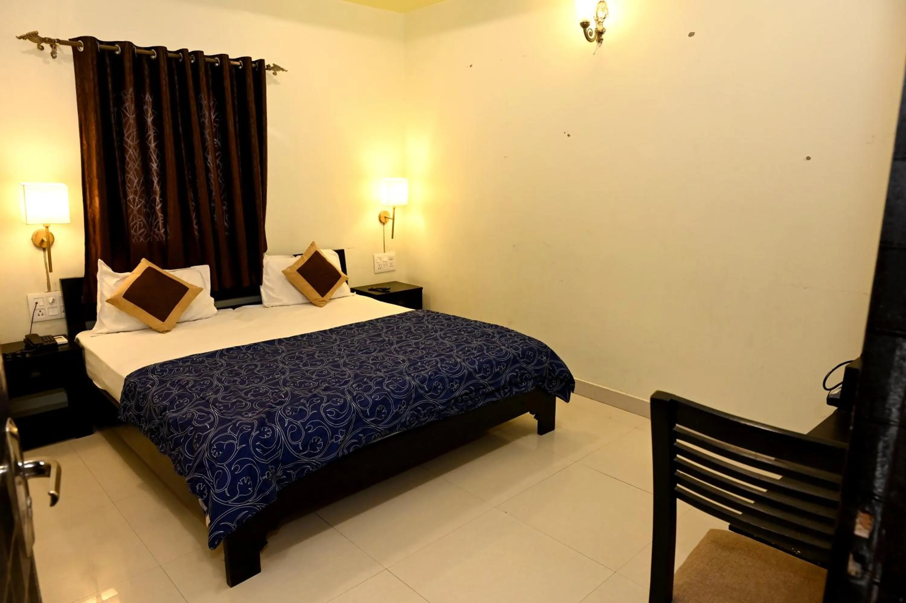 Bed in Om Heritage Haveli