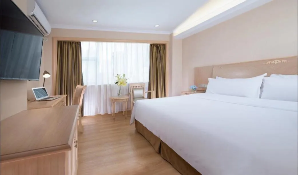 Bed in Vienna Hotel Shenzhen Haiwan