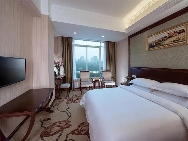 Bed in Vienna Hotel Guangzhou Shaheding Metro Station