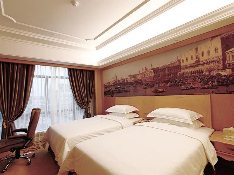 Bed in Vienna Hotel Shanghai Songjiang Development Zone