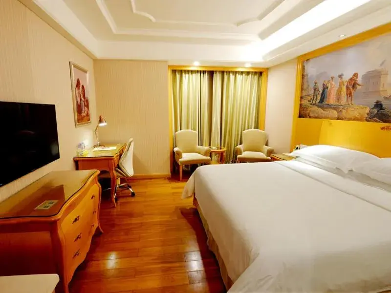 Bed in Vienna International Hotel Shenzhen Guangming Avenue Bed in Vienna International Hotel Shenzhen Guangming Avenue