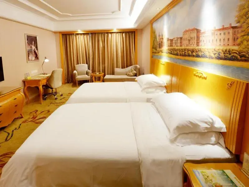 Bed in Vienna International Hotel Shenzhen Guangming Avenue Bed in Vienna International Hotel Shenzhen Guangming Avenue