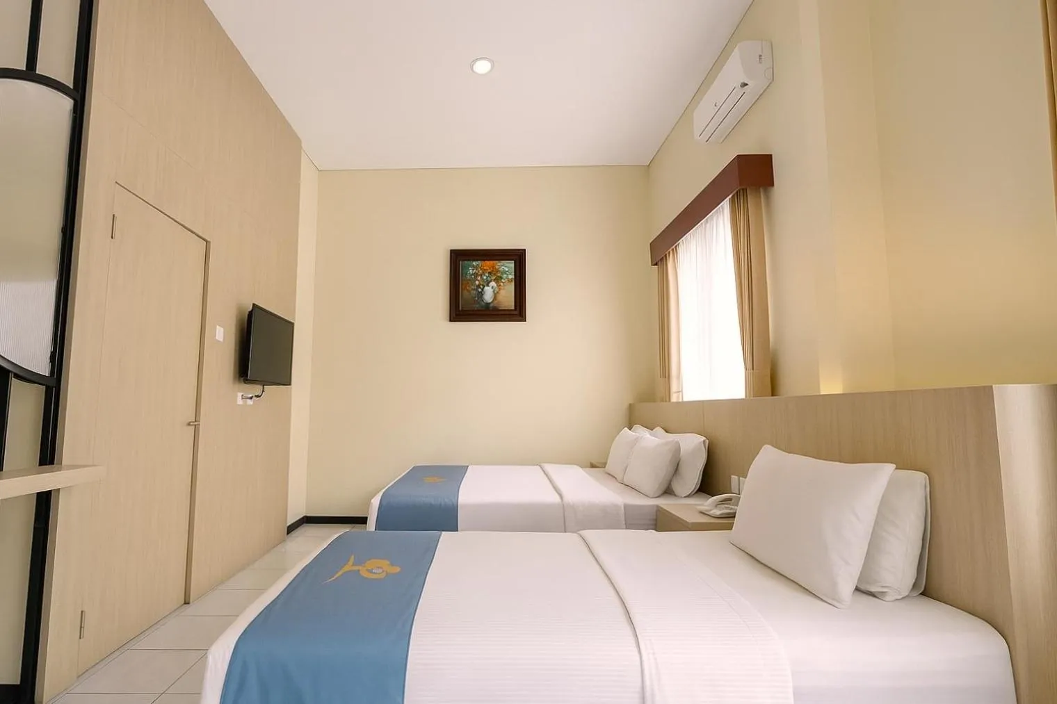 Bed in Ciptaningati Culture Hotel Batu