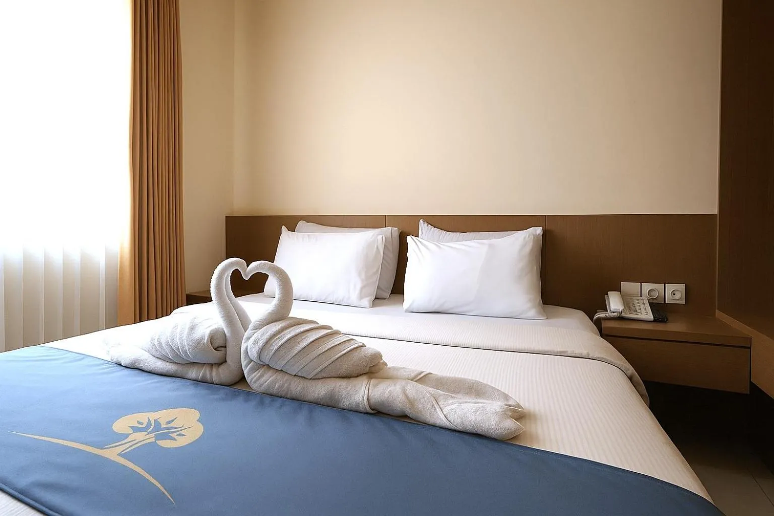 Bed in Ciptaningati Culture Hotel Batu