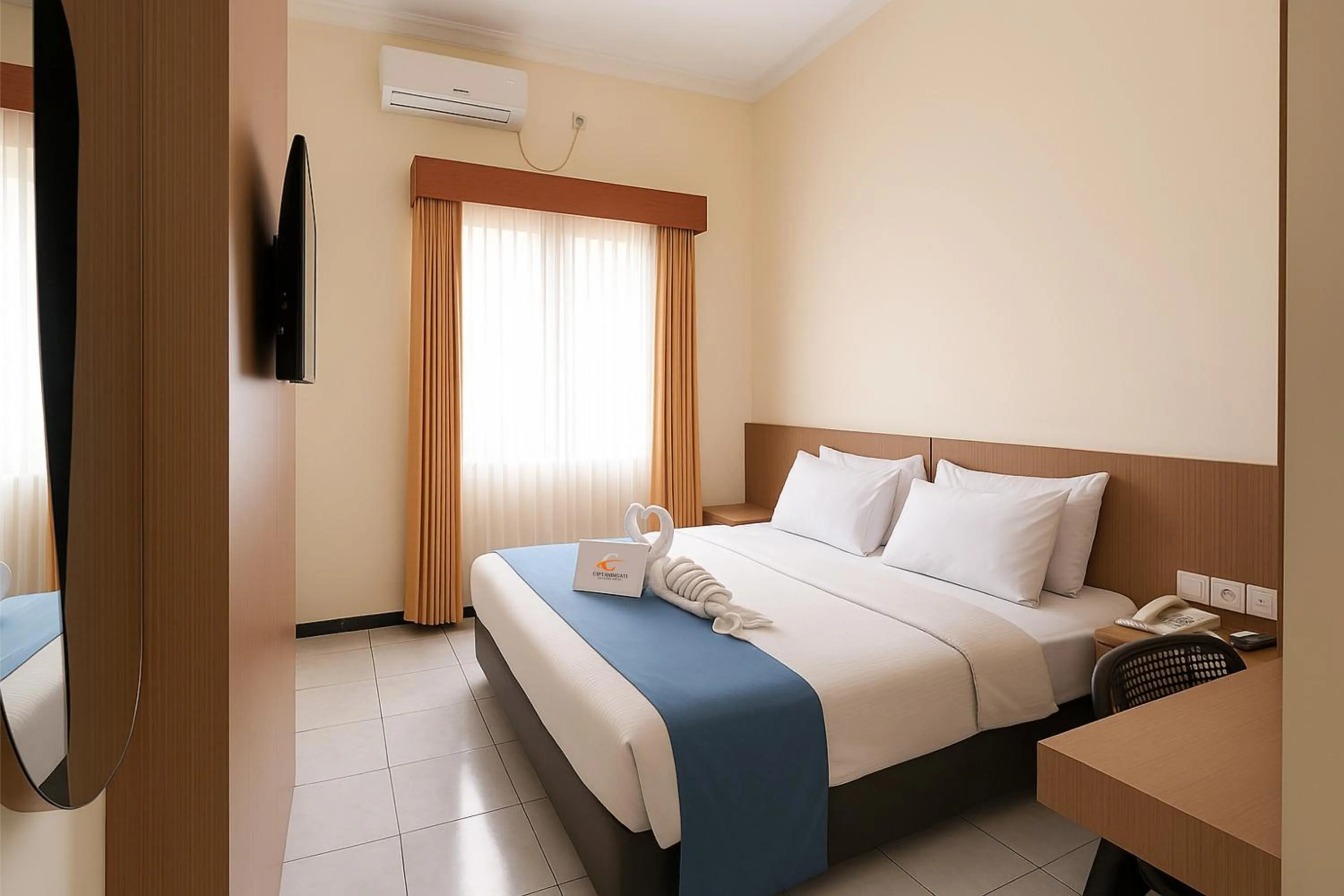 Bed in Ciptaningati Culture Hotel Batu