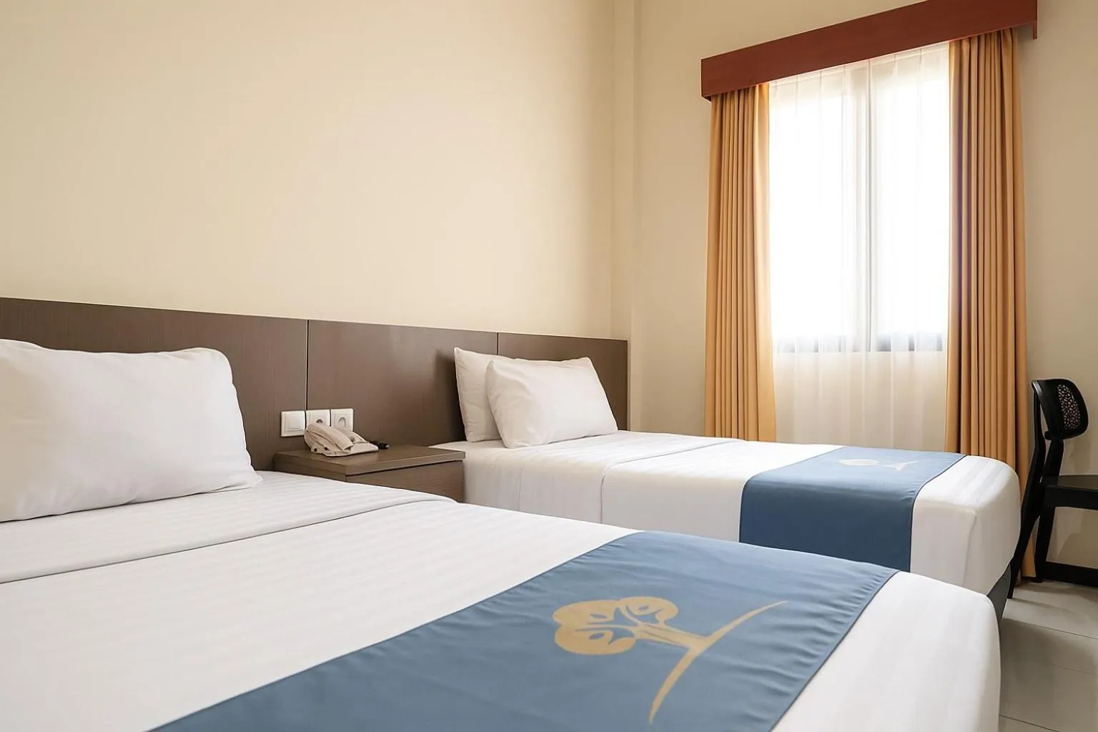 Bed in Ciptaningati Culture Hotel Batu