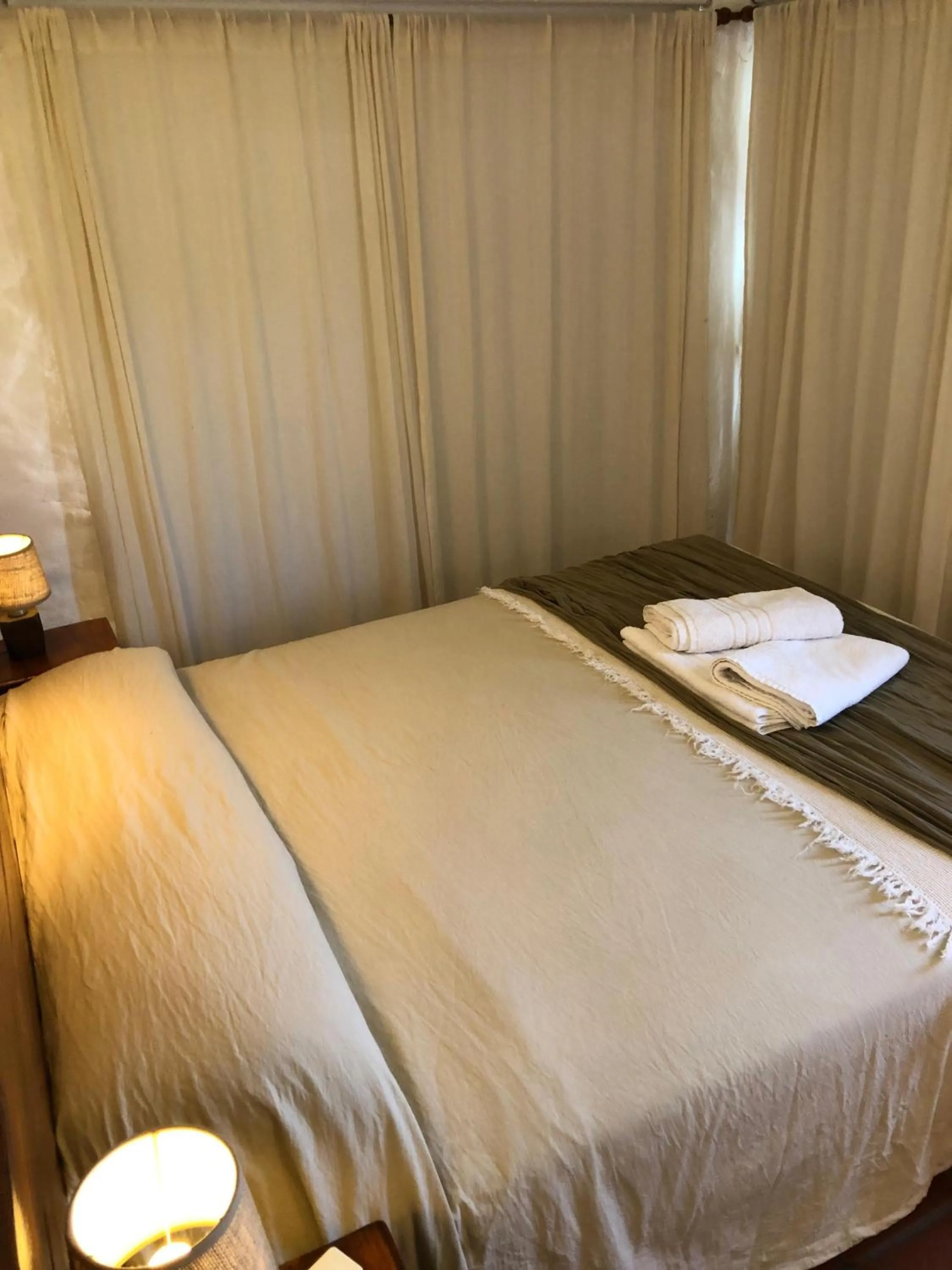 Bed in El Faro de Carpier - ApartHotel & Restaurante Bar Cafetería