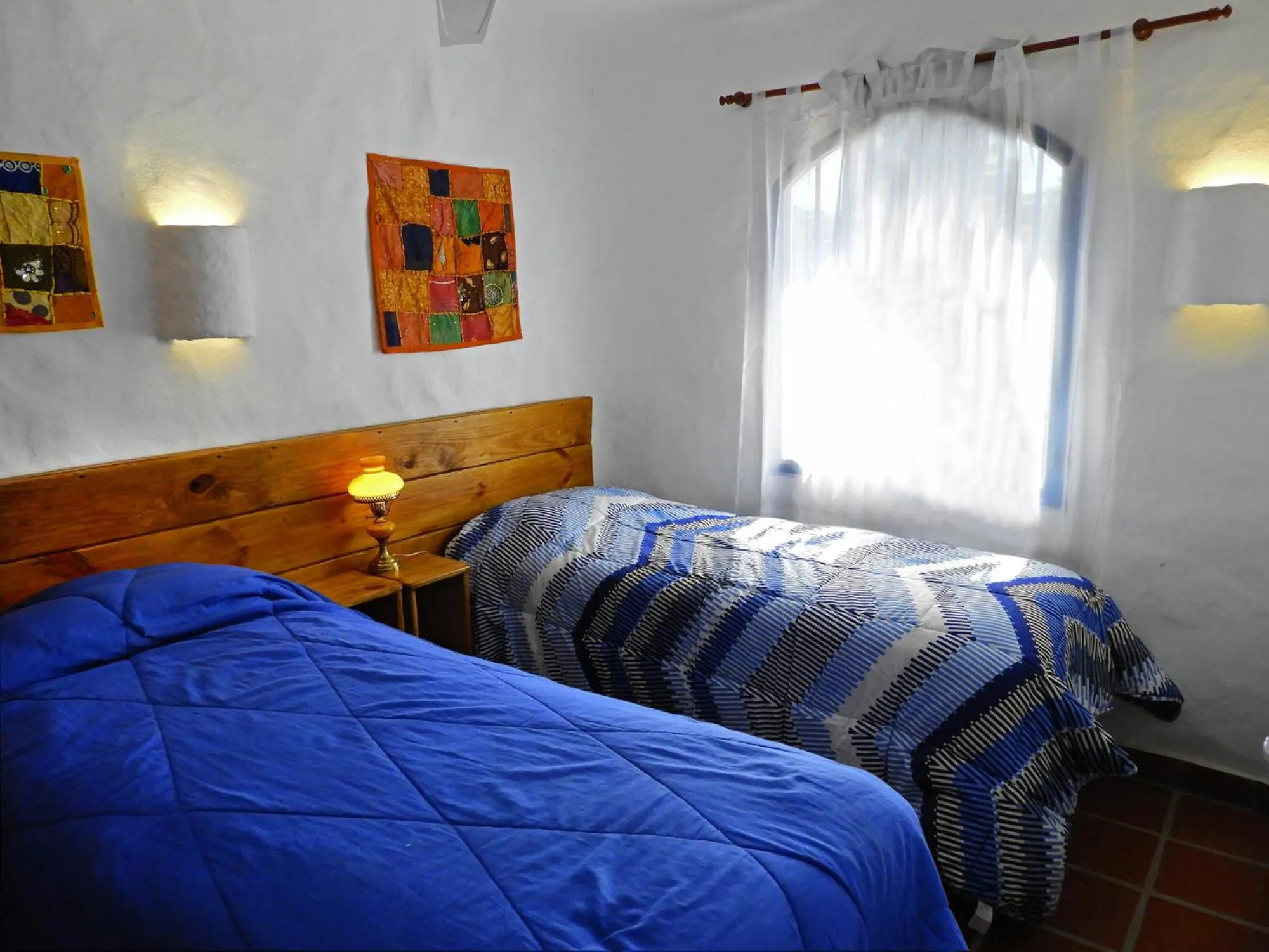 Bed in El Faro de Carpier - ApartHotel & Restaurante Bar Cafetería