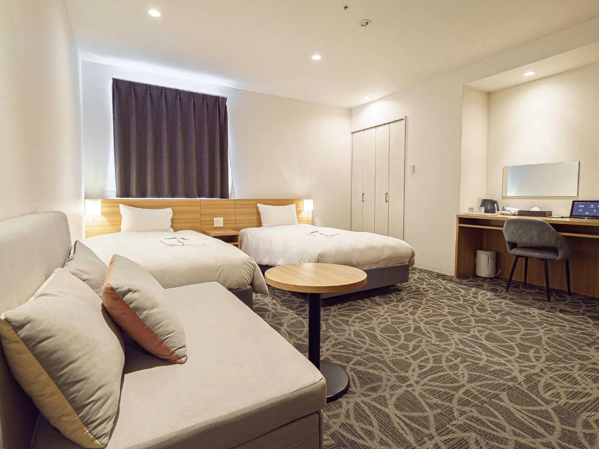 Bed in Sakura Garden Hotel