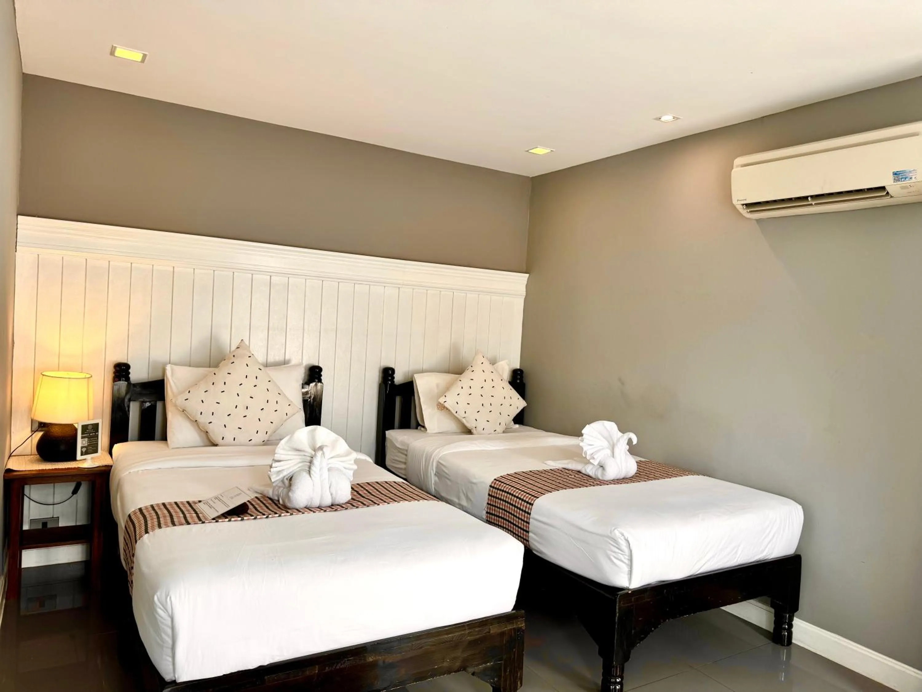 Bed in WUA LAI Boutique Hotel Chiang Mai