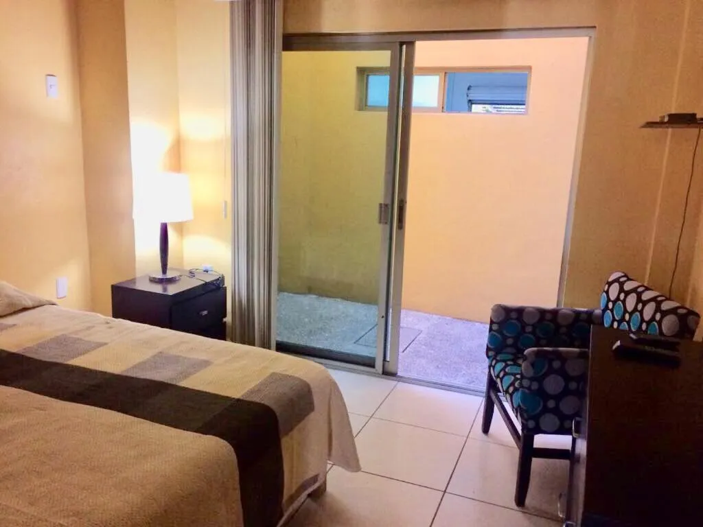 Bed in Andressa Mia Apartments