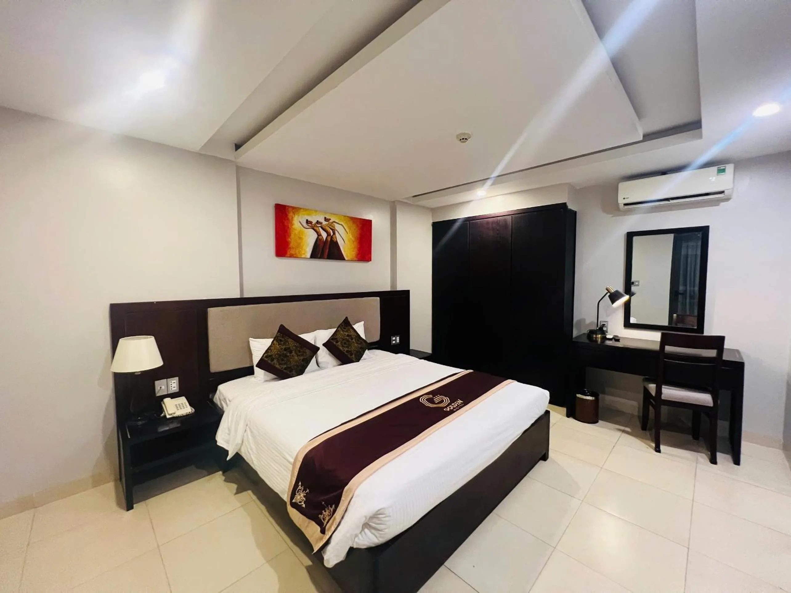 Bed in Golden Quang Tri Hotel