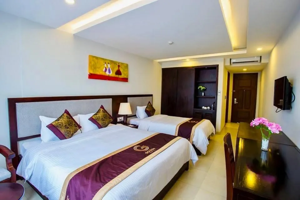 Bed in Golden Quang Tri Hotel