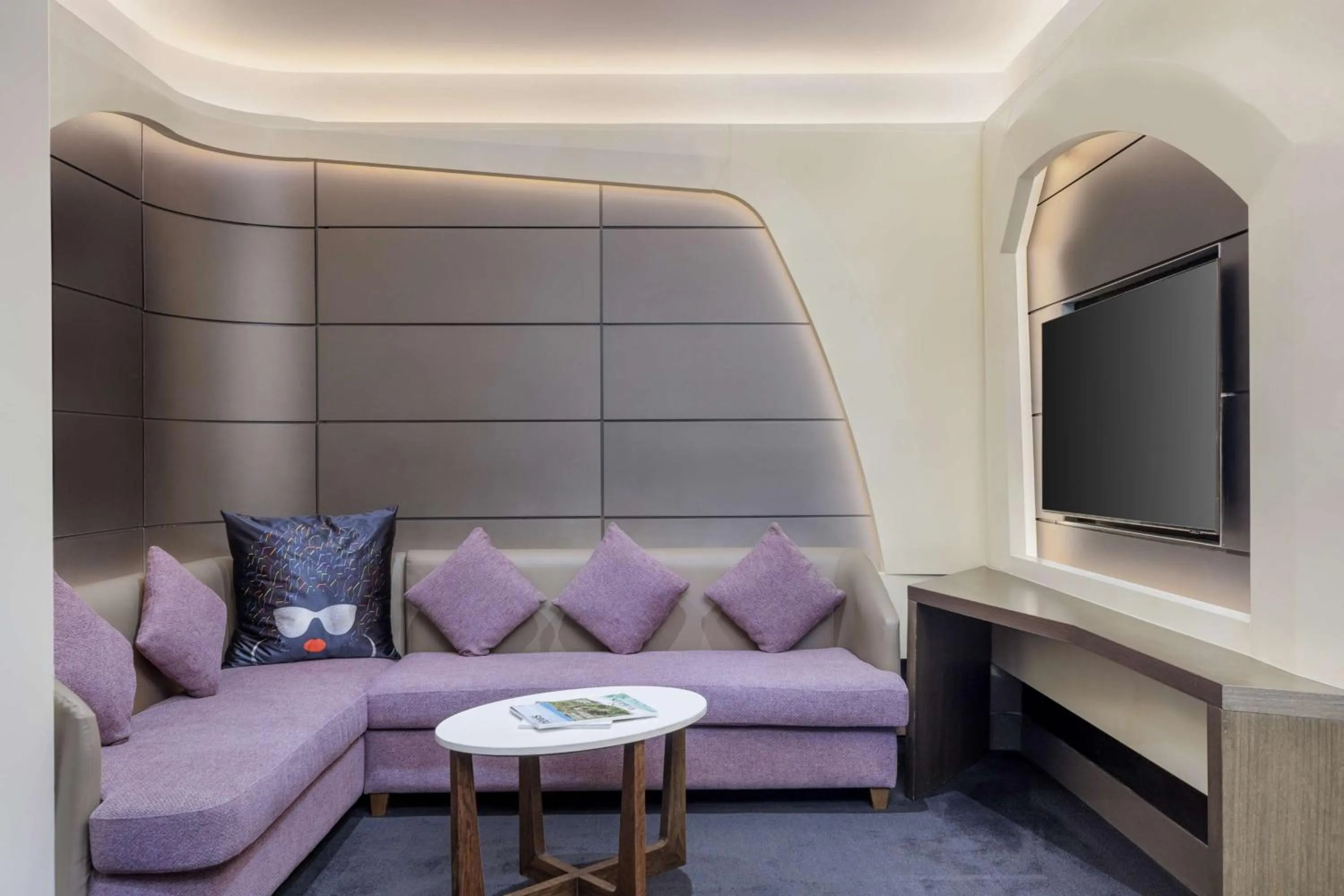 Living room in V Hotel Dubai, Curio Collection by Hilton