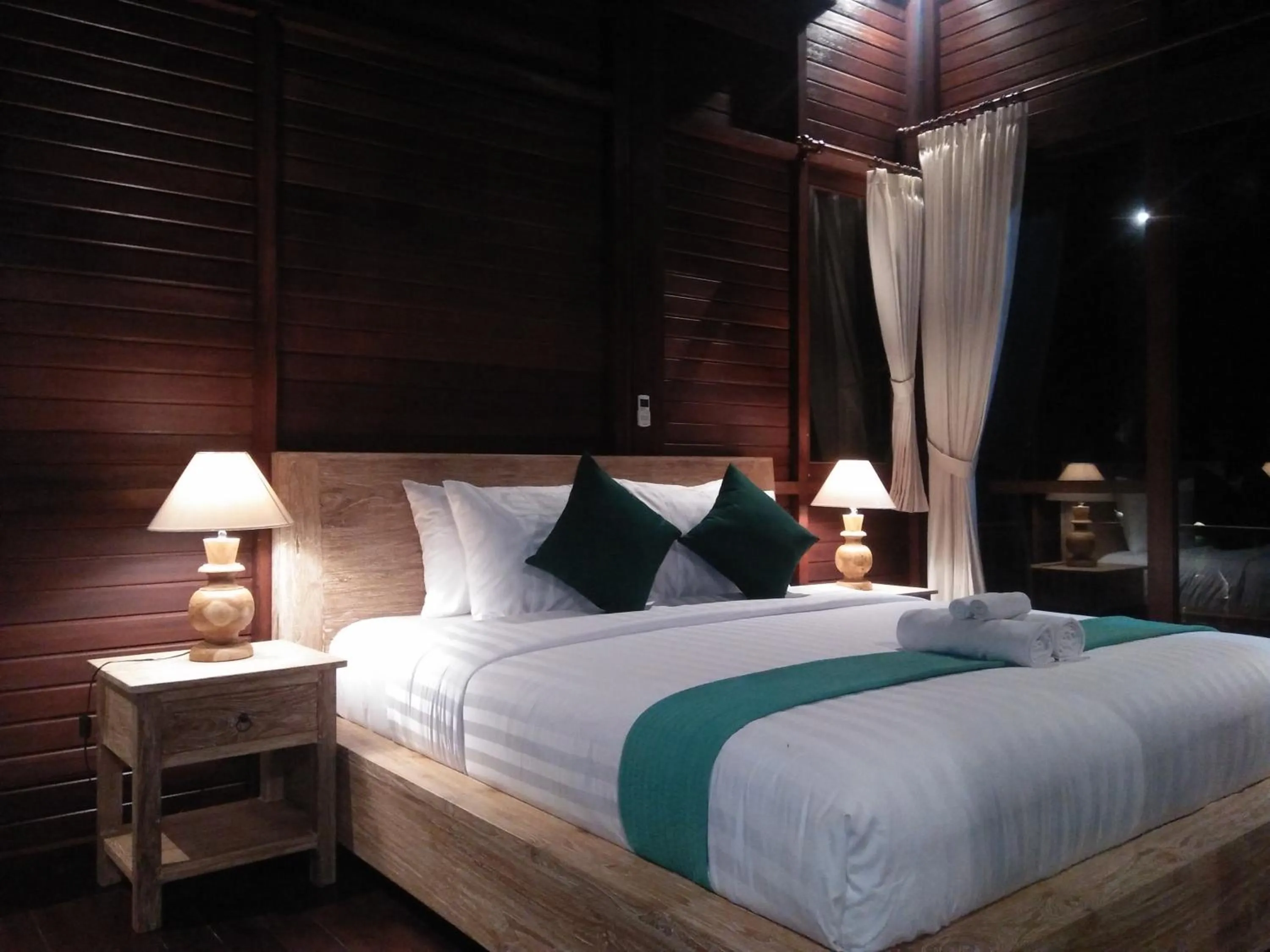 Bed in Villa Wedang