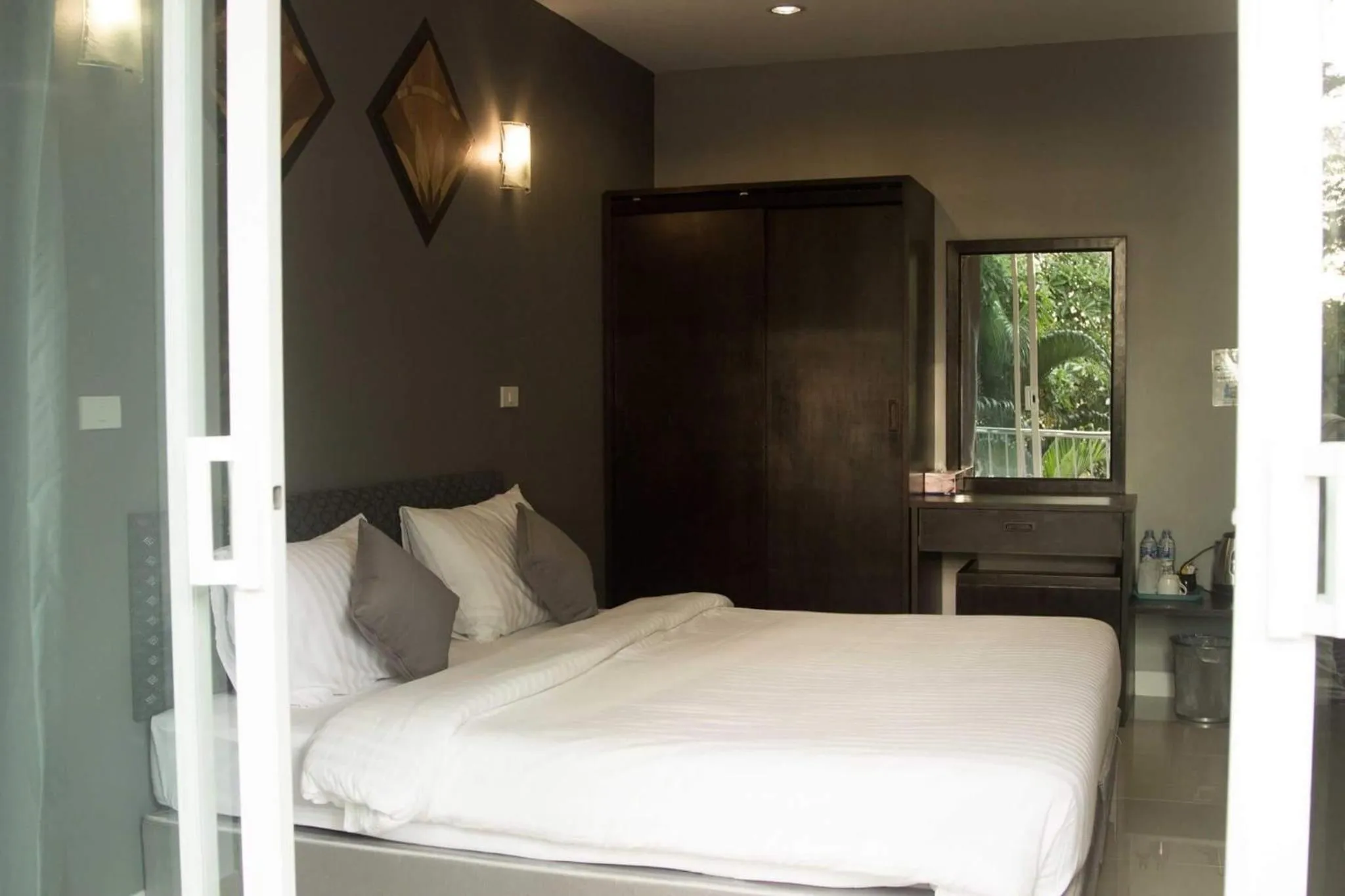 Photo of the whole room, Bed in MJ Boutique Hotel Khao Lak