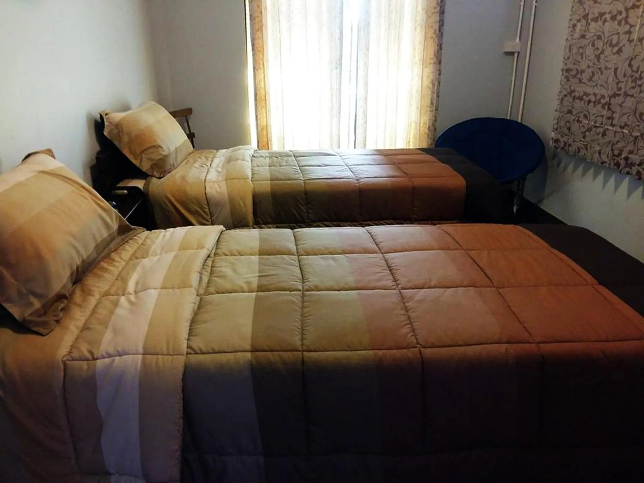 Bed in Chommuang Guest House