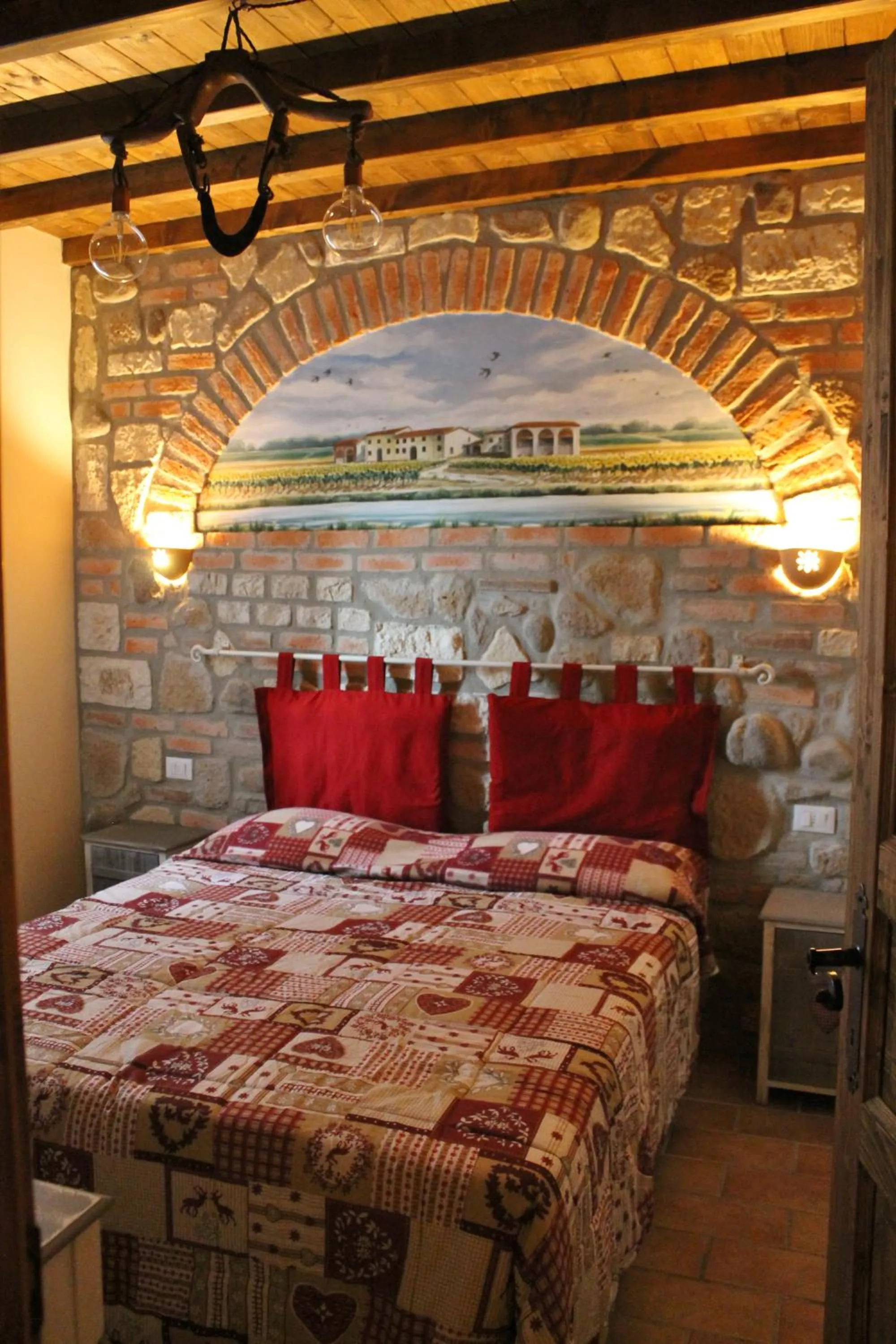 Photo of the whole room, Bed in La Casa Delle Rondini