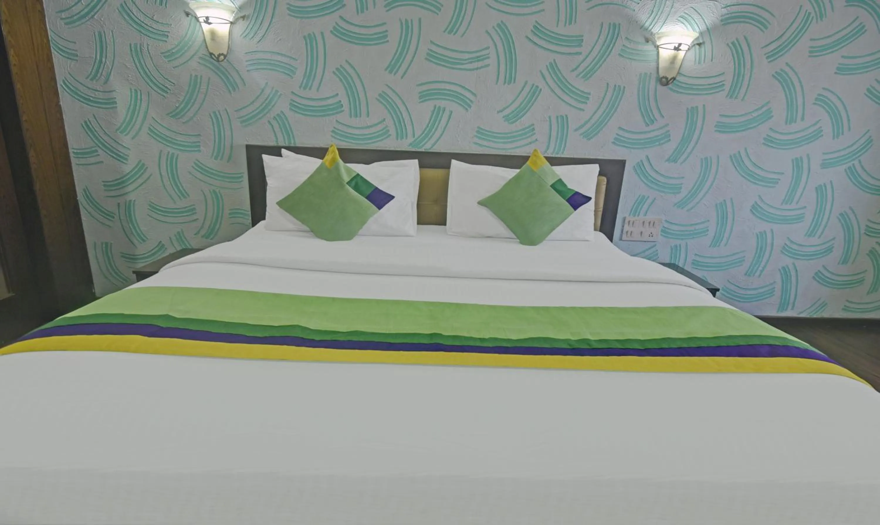 Bedroom, Bed in Treebo Savoury Sea Shell Residency