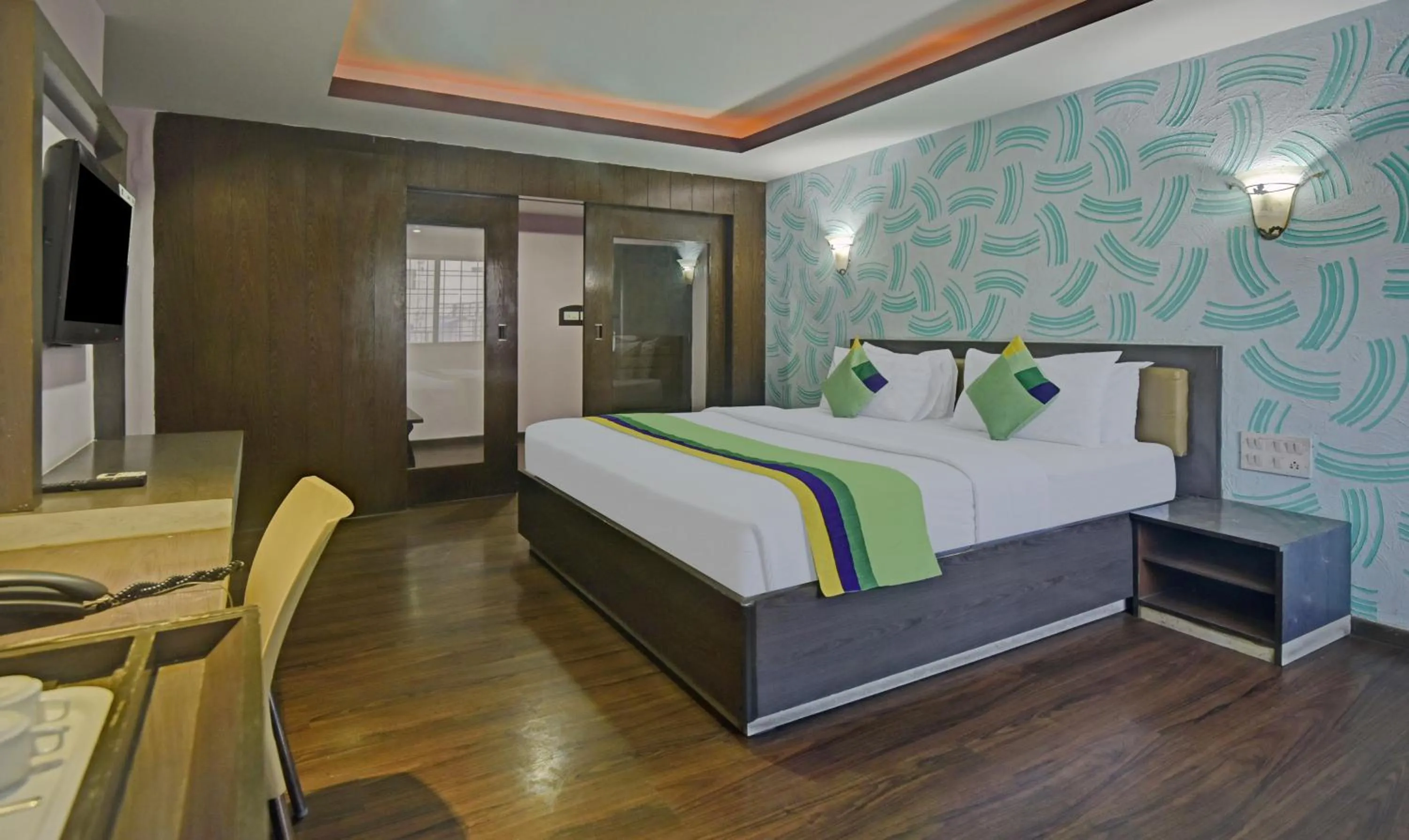 Bedroom, Bed in Treebo Savoury Sea Shell Residency