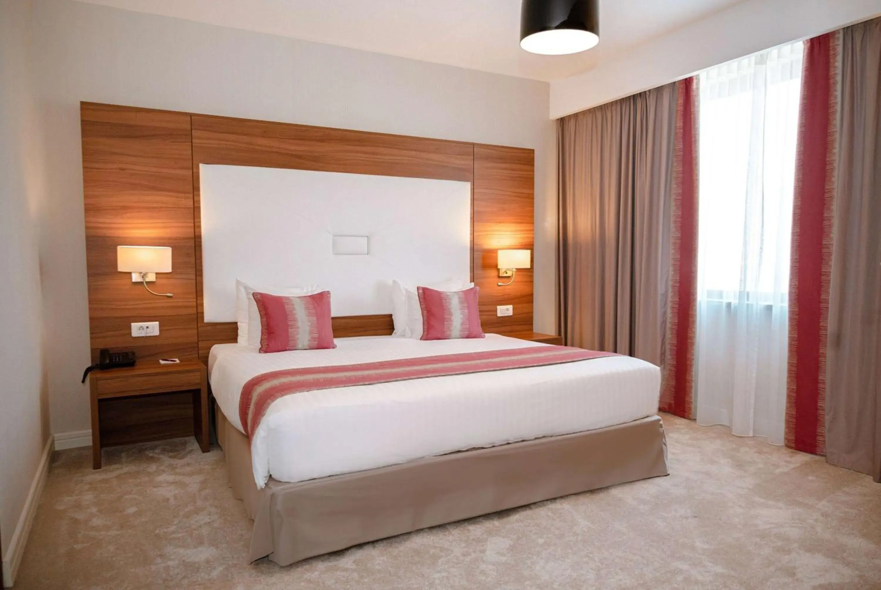 Photo of the whole room, Bed in Ramada Plaza Craiova Photo of the whole room, Bed in Ramada Plaza Craiova