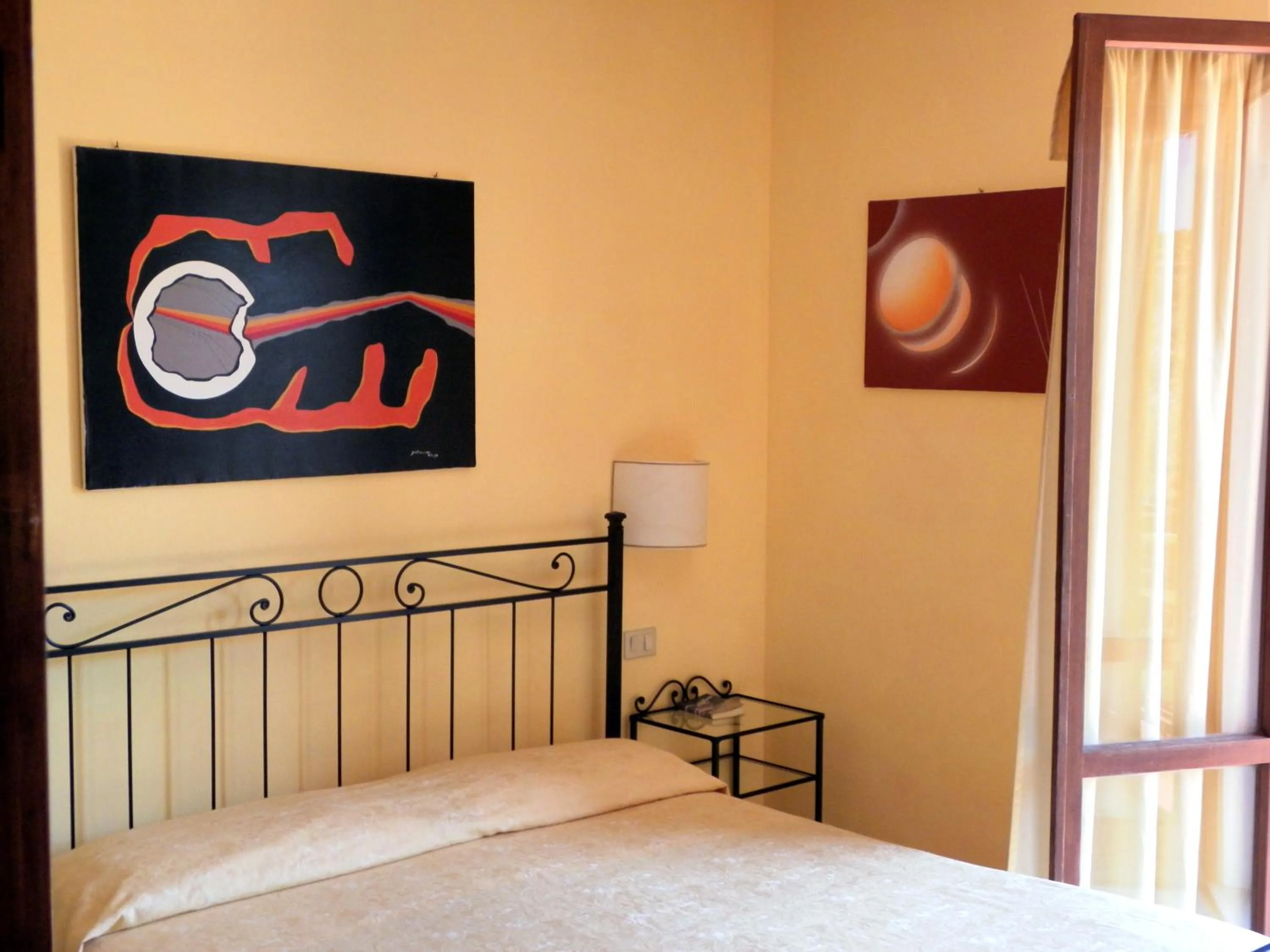 Decorative detail, Bed in Hotel Il Caminetto