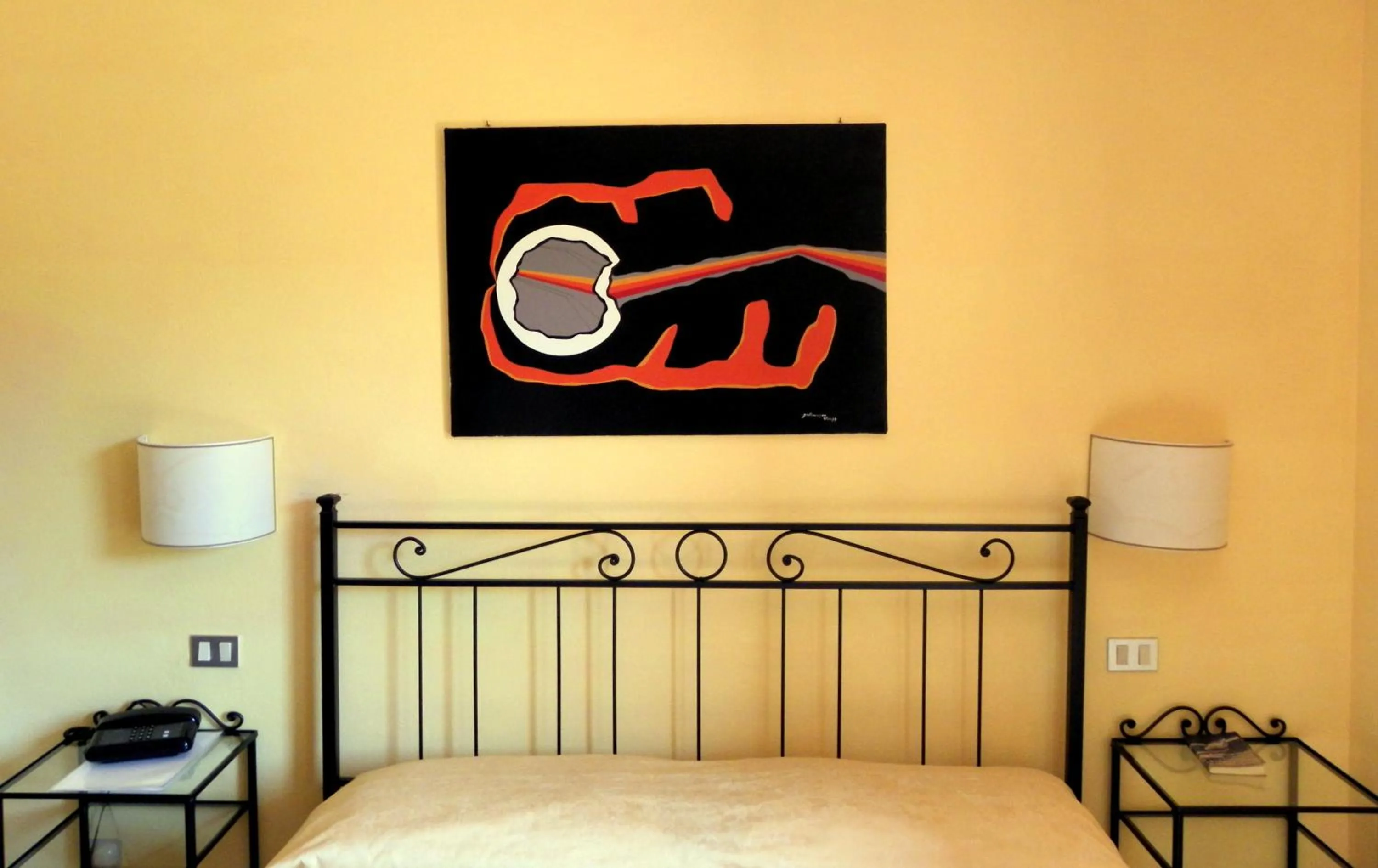 Decorative detail, Bed in Hotel Il Caminetto