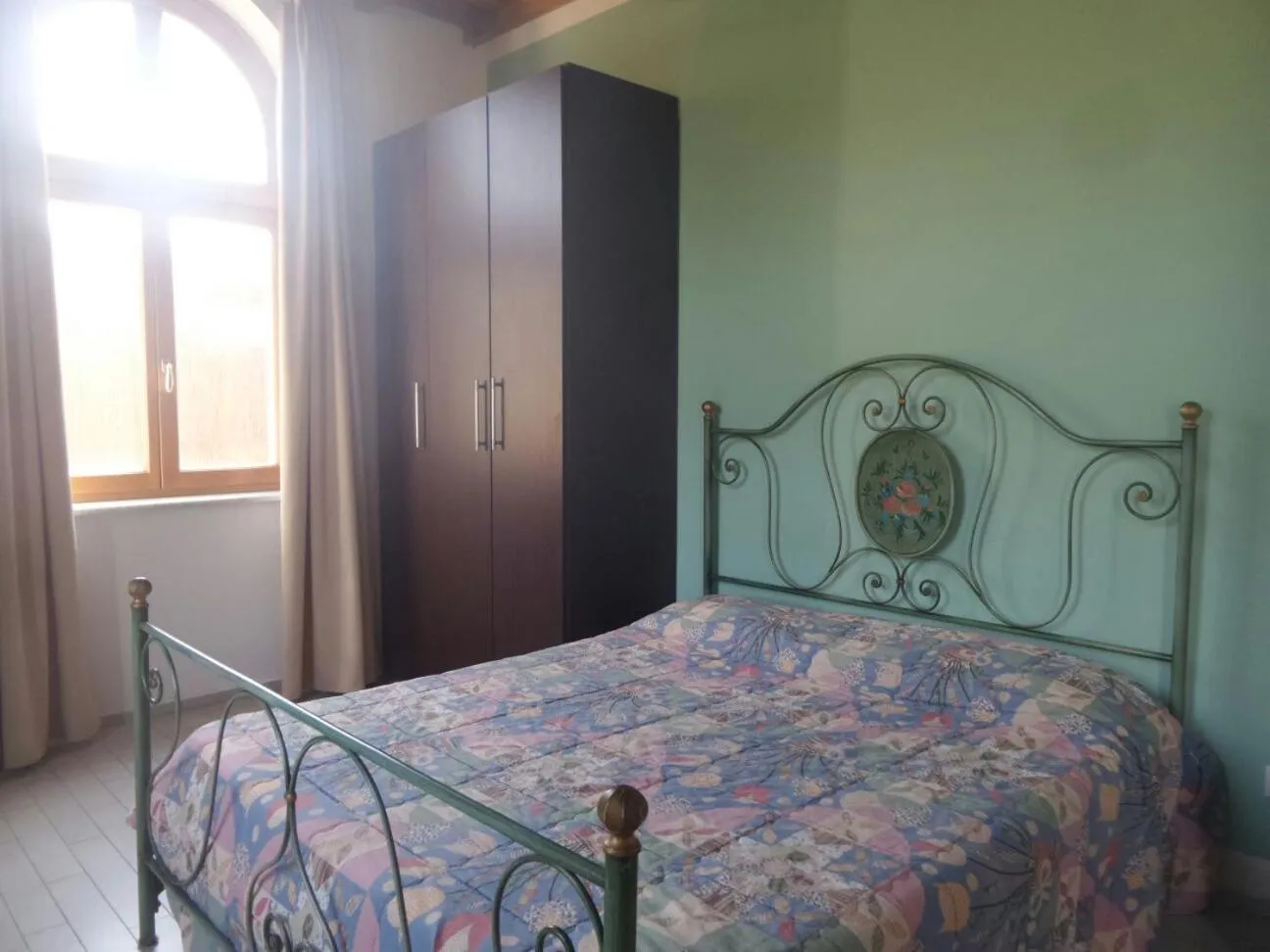 Photo of the whole room, Bed in Cala Dei Mori