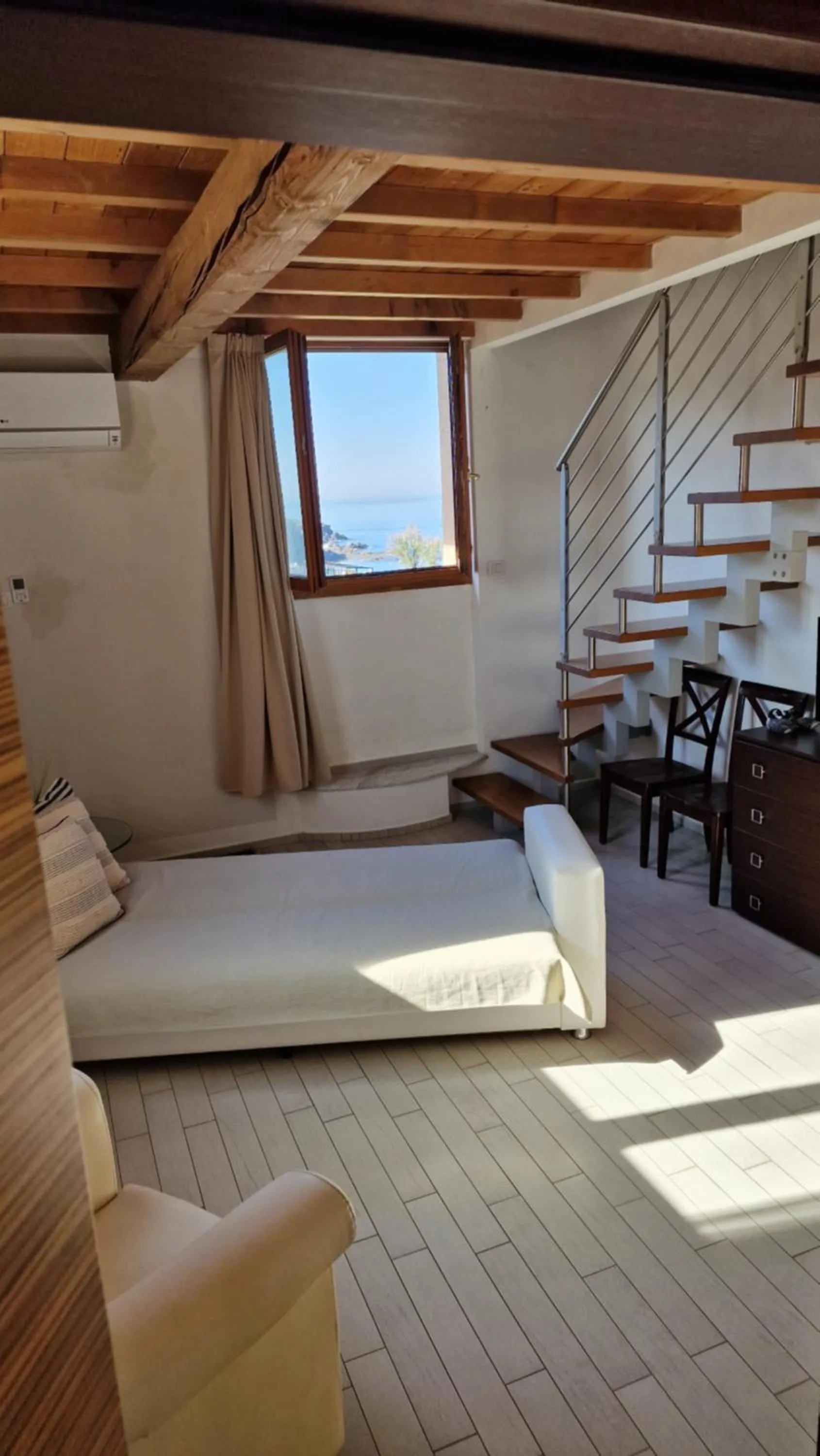 Seating area, Bed in Cala Dei Mori