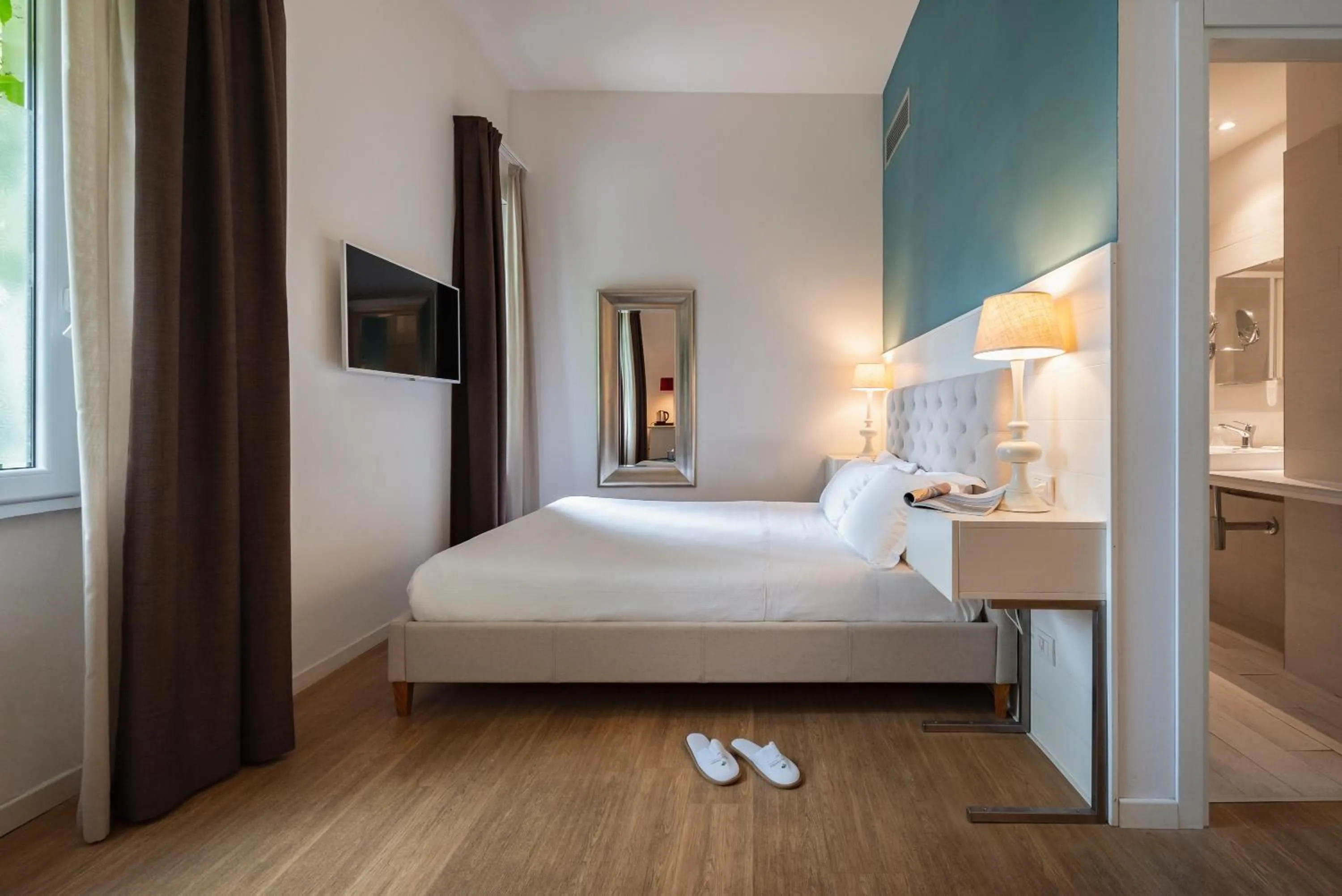 Bed in Marina Garden Hotel