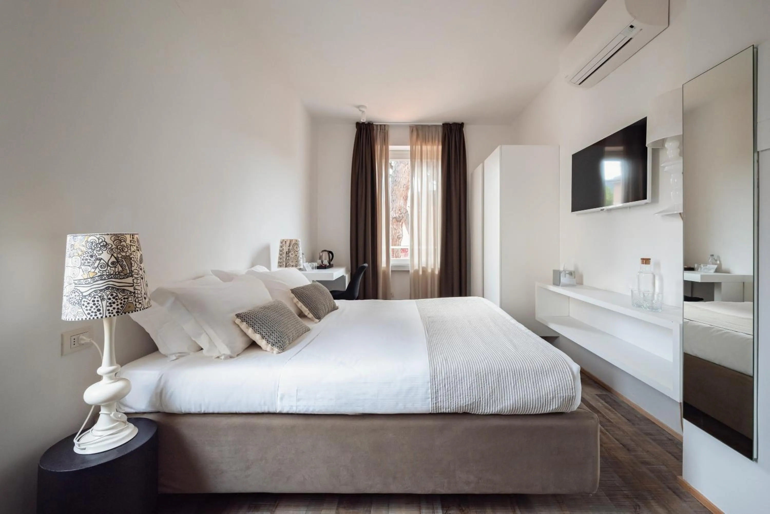 Bed in Marina Garden Hotel