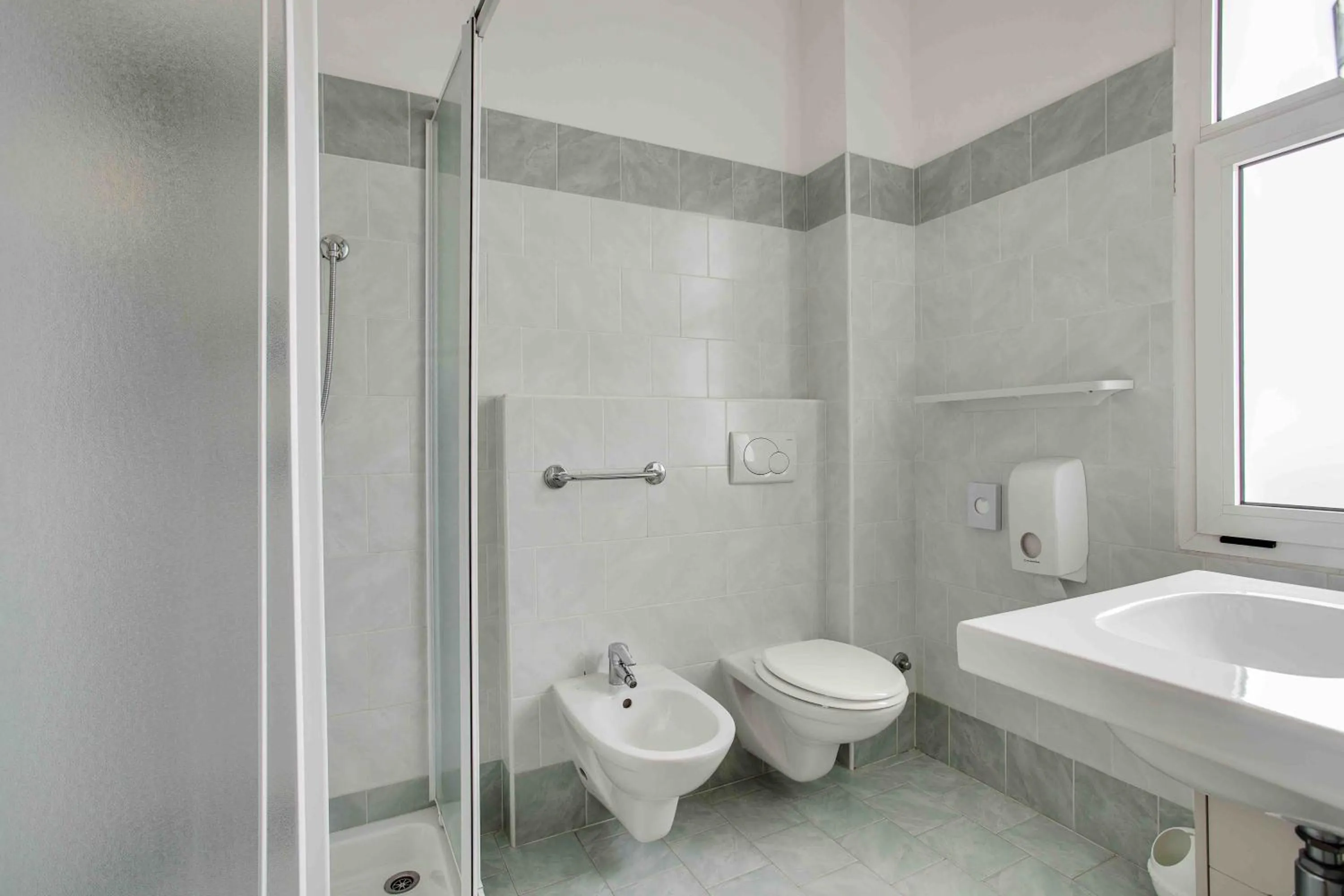 Bathroom in Hotel Adler