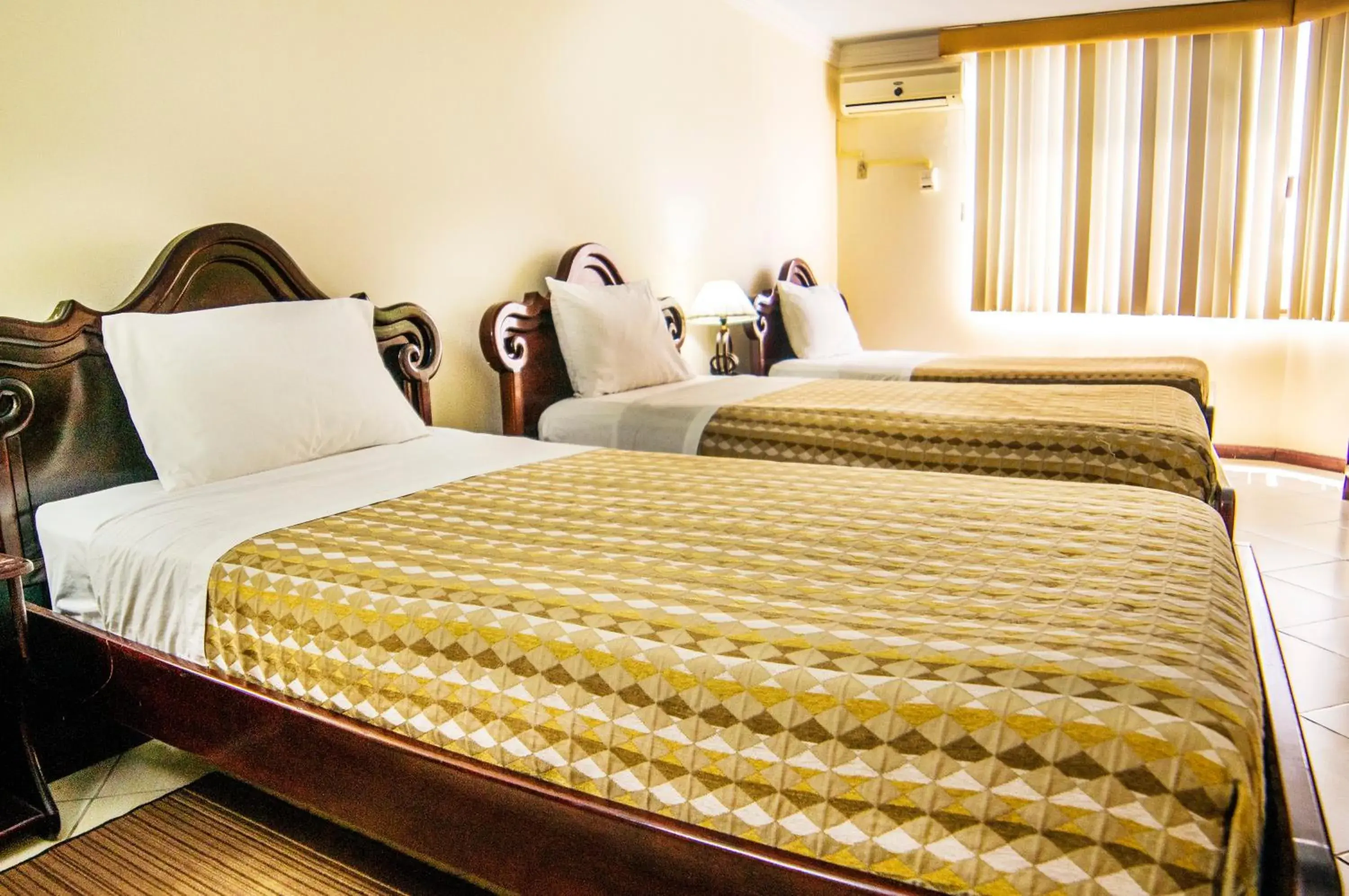 Triple Room in Hotel El Auca Triple Room in Hotel El Auca