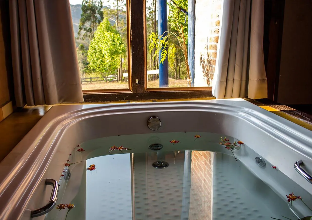 Hot Tub in Pousada Cabanas no Mundo