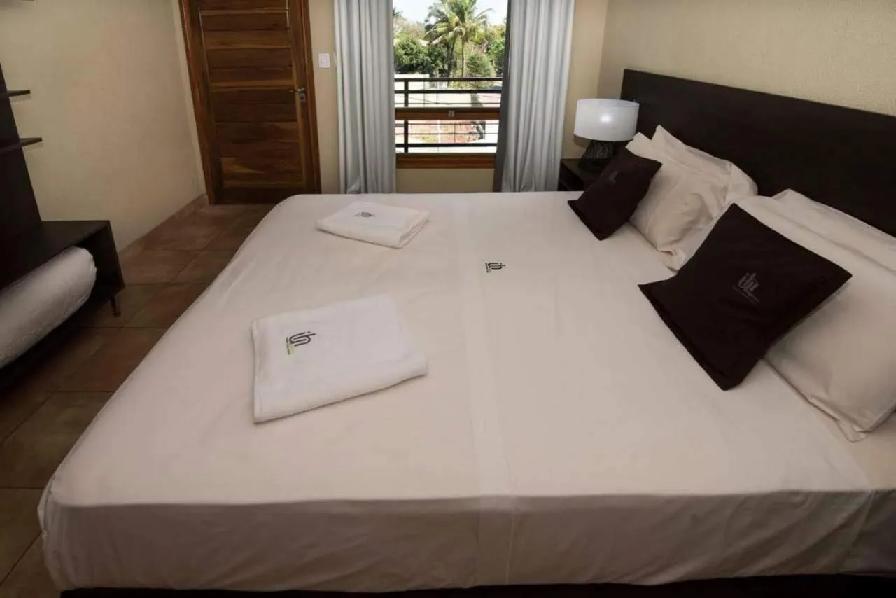 Bed in Iguazú Urban Hotel Express