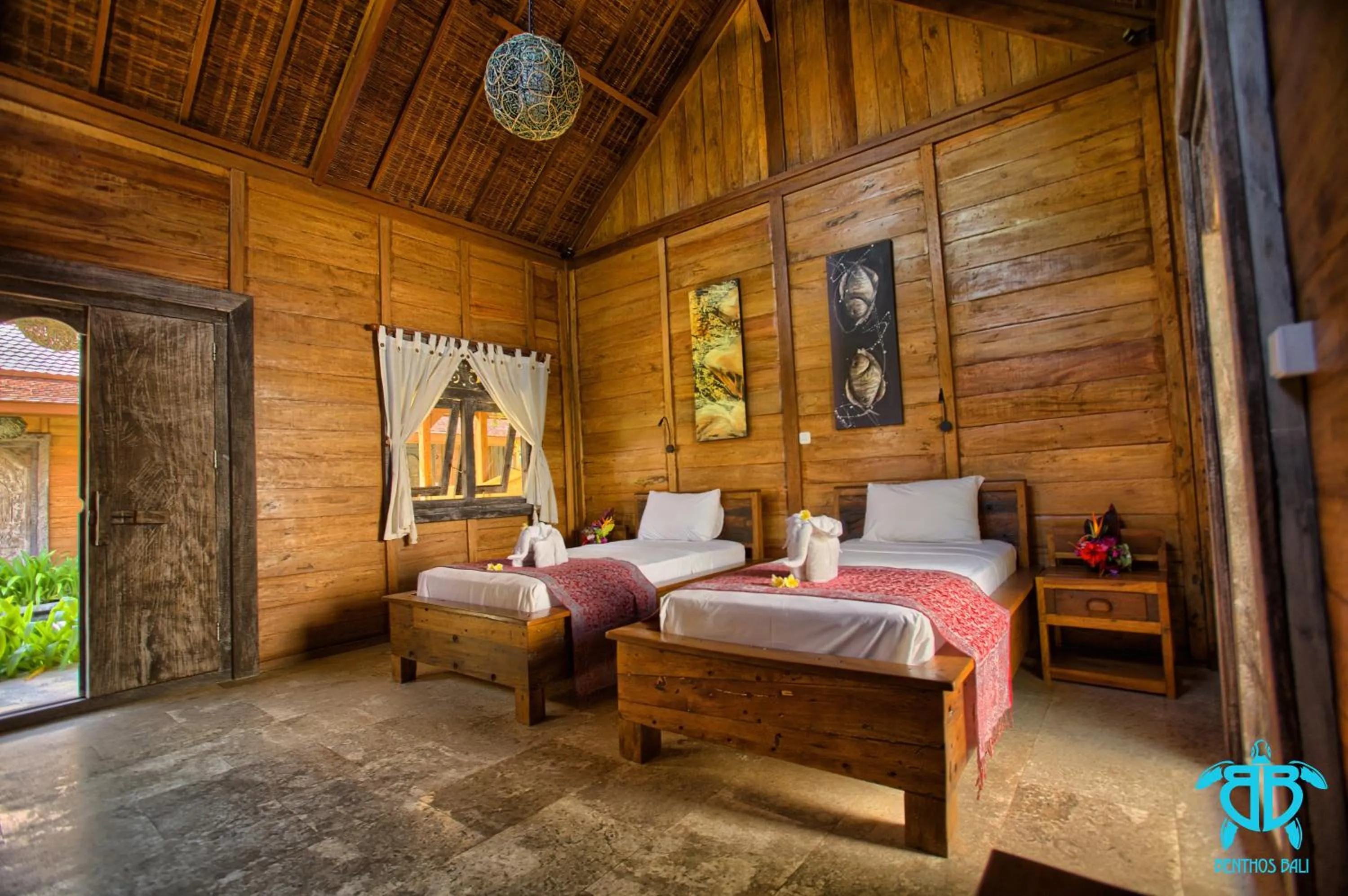 Bed in Benthos Bali Dive Resort