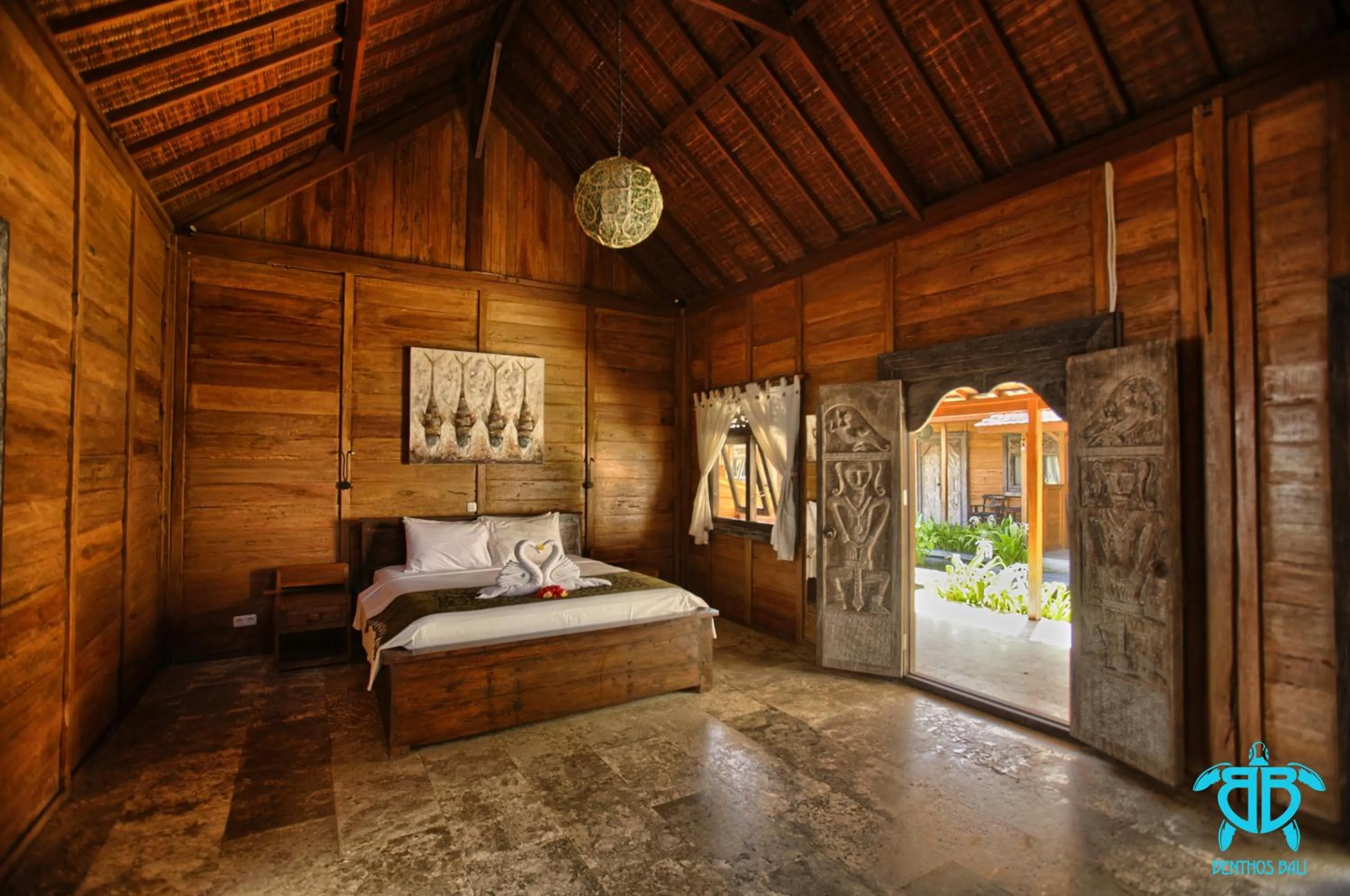 Bed in Benthos Bali Dive Resort