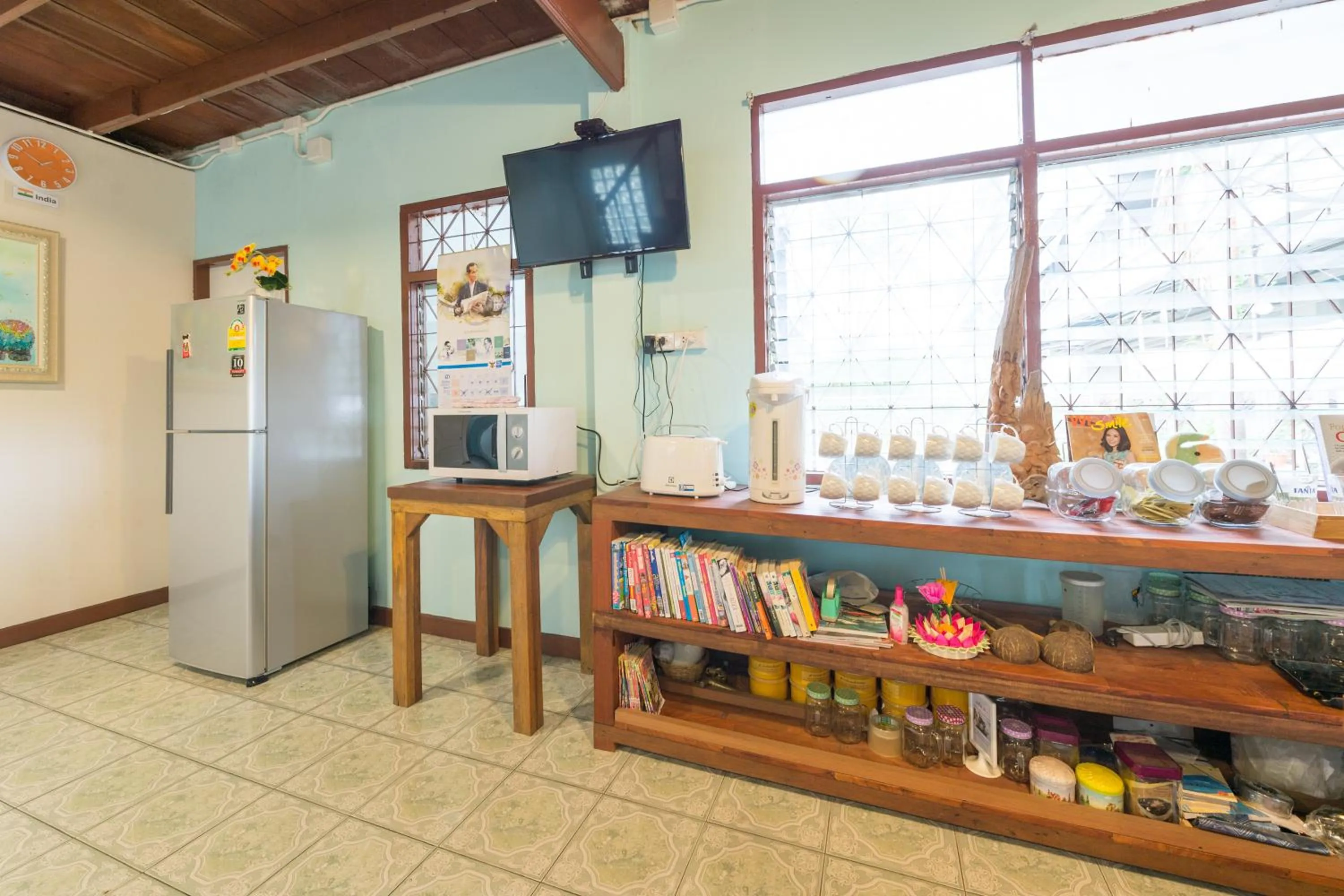 Communal lounge/ TV room in Nang Ta Yon @ Ban Thap Chang Hostel