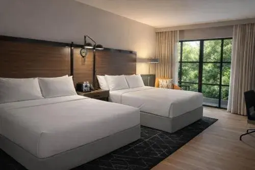 Queen Room with Two Queen Beds and Historic Town View - single occupancy - Hearing Accessible in The Lawrence Hotel Lawrenceville, Tapestry Collection Hilton Queen Room with Two Queen Beds and Historic Town View - single occupancy - Hearing Accessible in The Lawrence Hotel Lawrenceville, Tapestry Collection Hilton