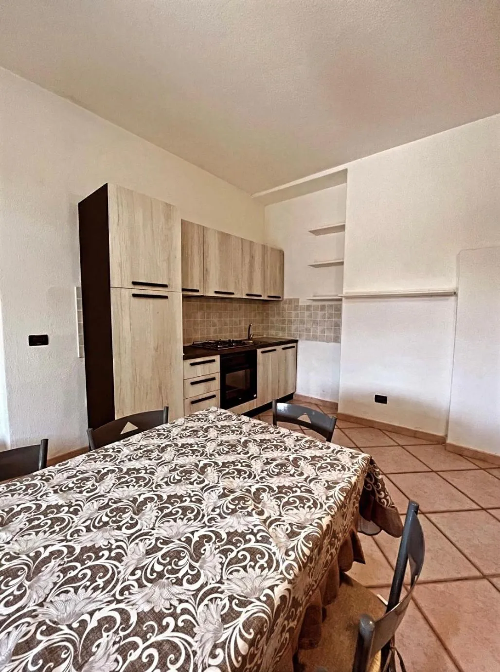 Kitchen or kitchenette in Case Vacanze Le Buganville