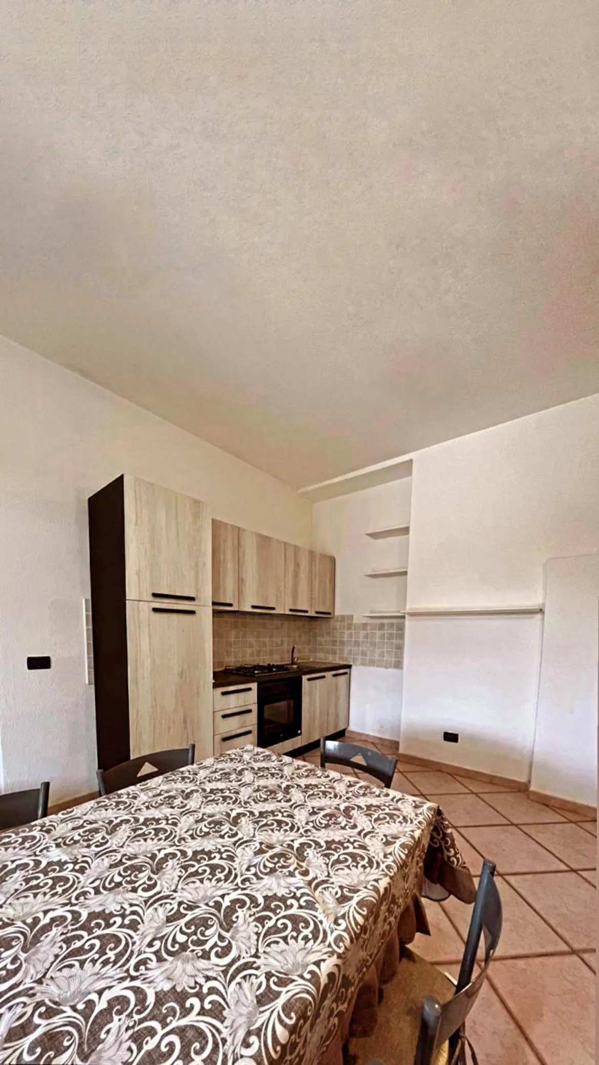 Kitchen or kitchenette in Case Vacanze Le Buganville