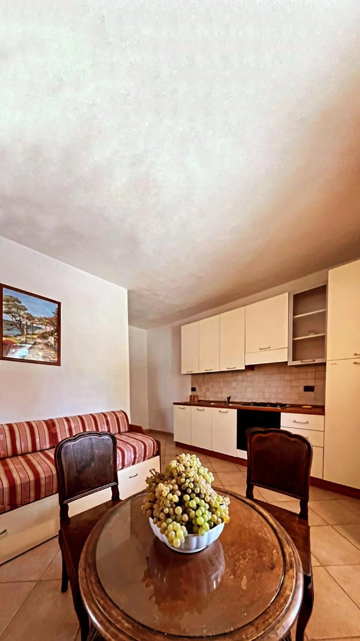 Kitchen or kitchenette in Case Vacanze Le Buganville