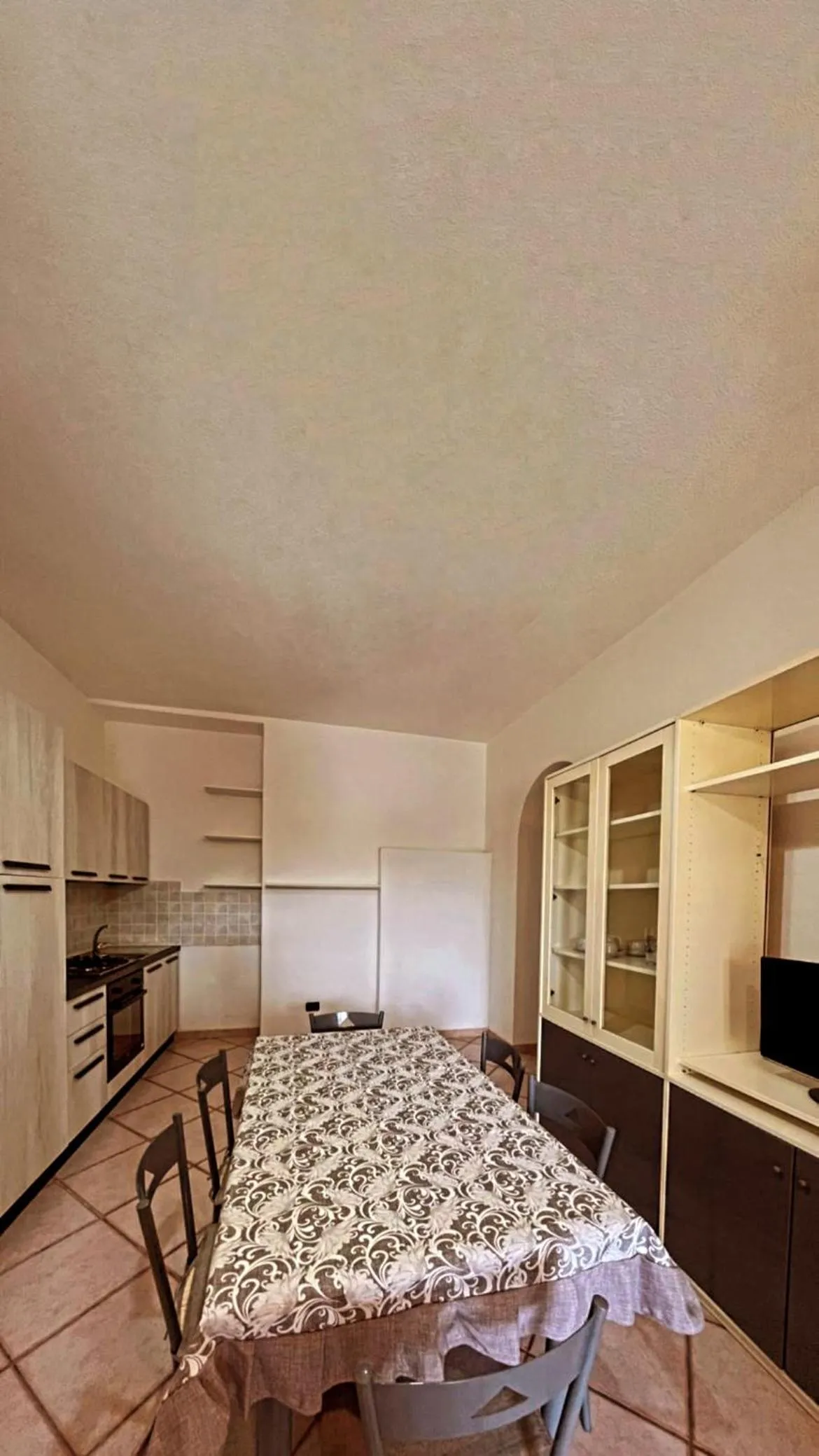 Kitchen or kitchenette in Case Vacanze Le Buganville