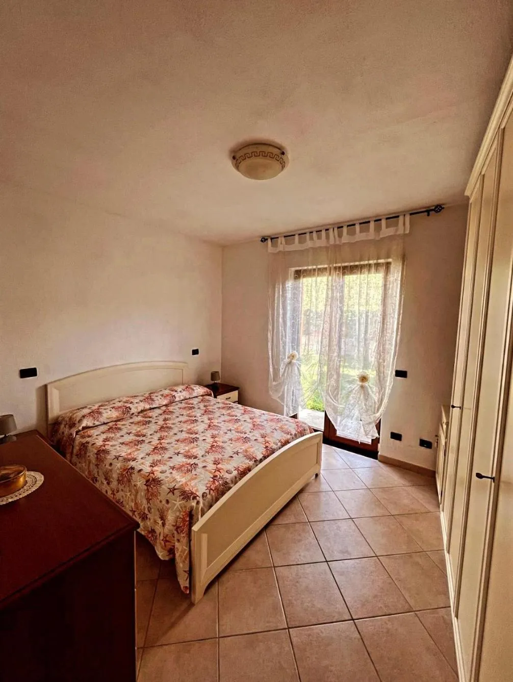 Photo of the whole room in Case Vacanze Le Buganville