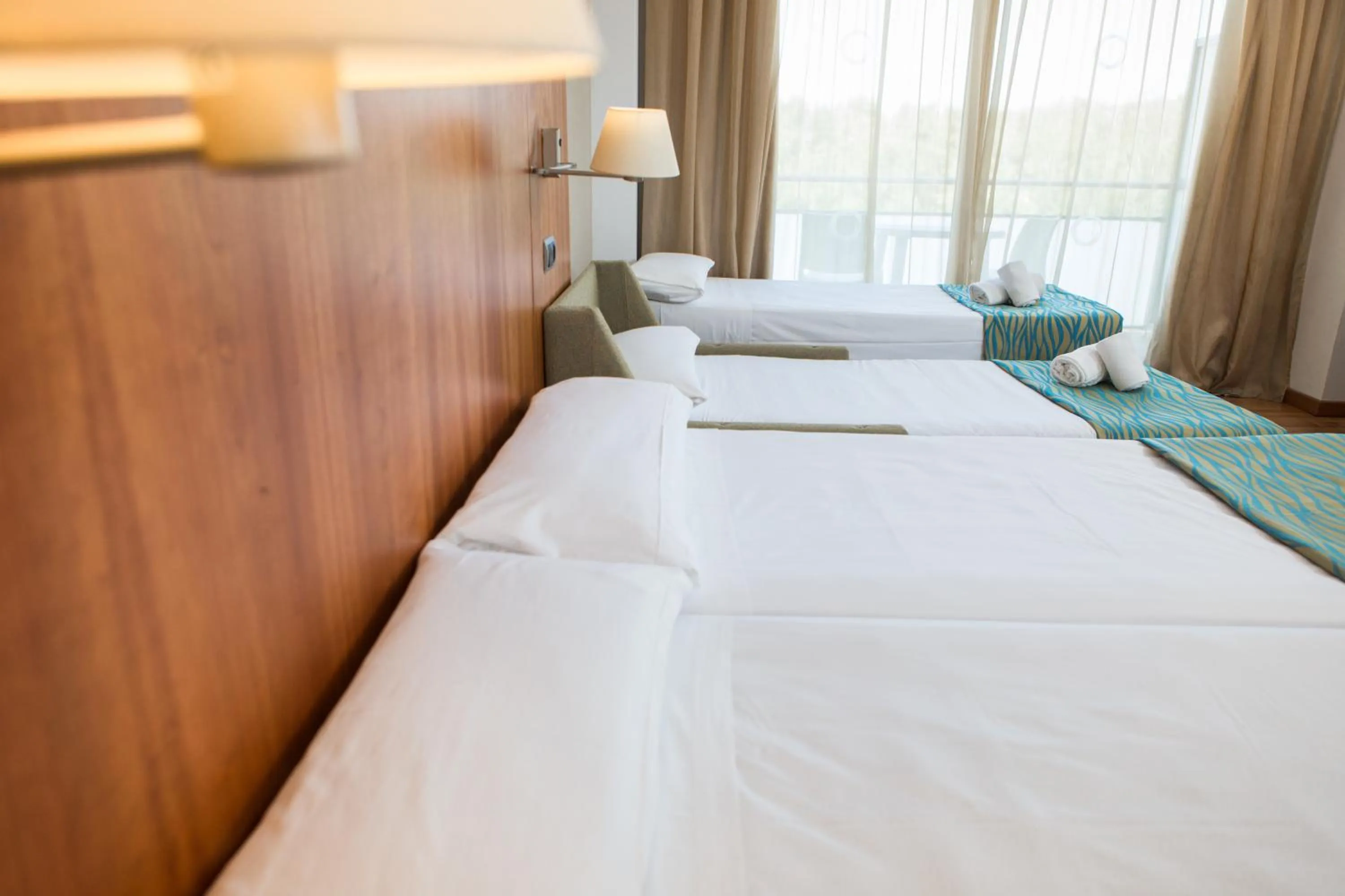 Bed in RVHotels Nautic Park