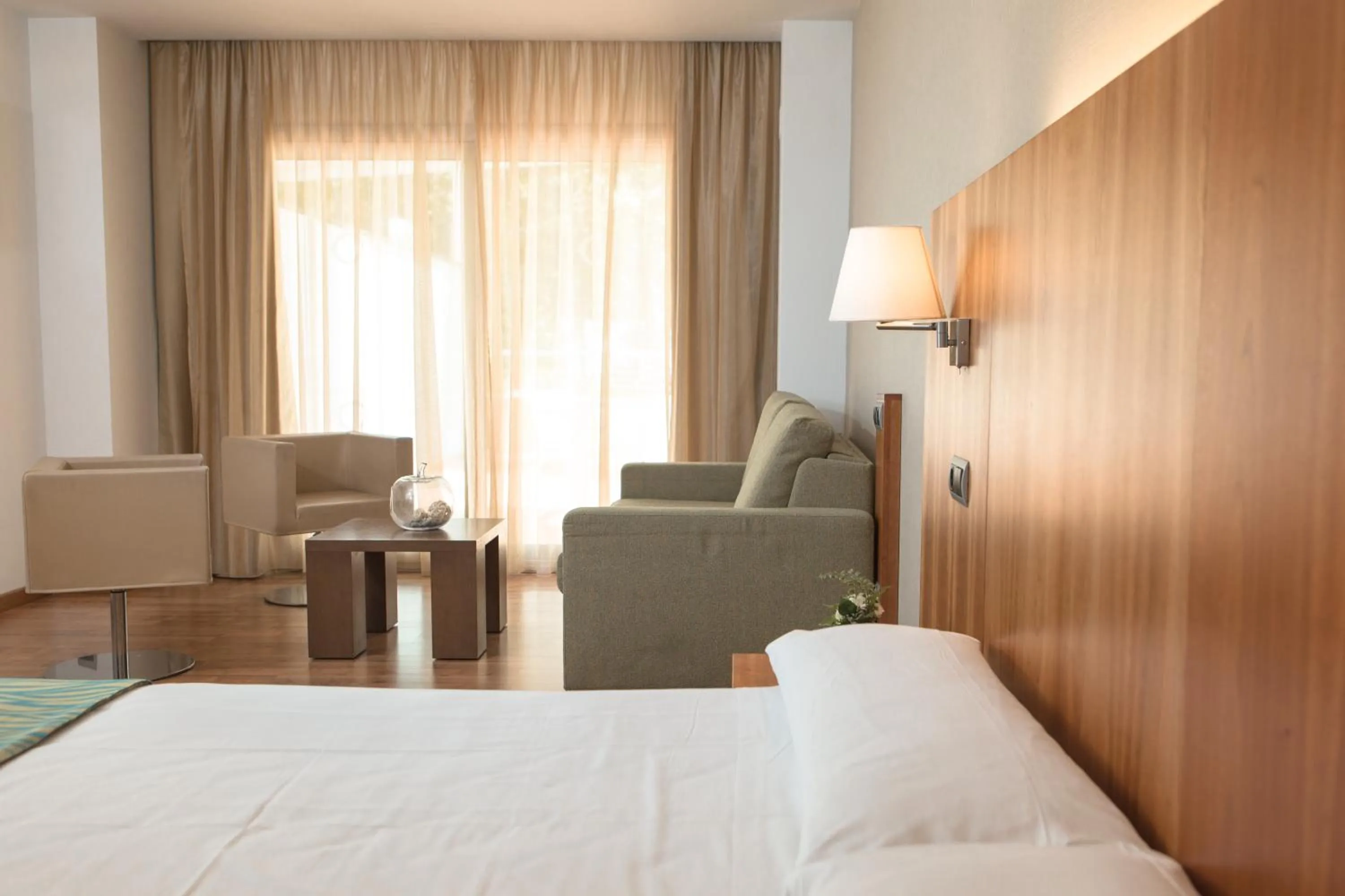 Seating area, Bed in RVHotels Nautic Park