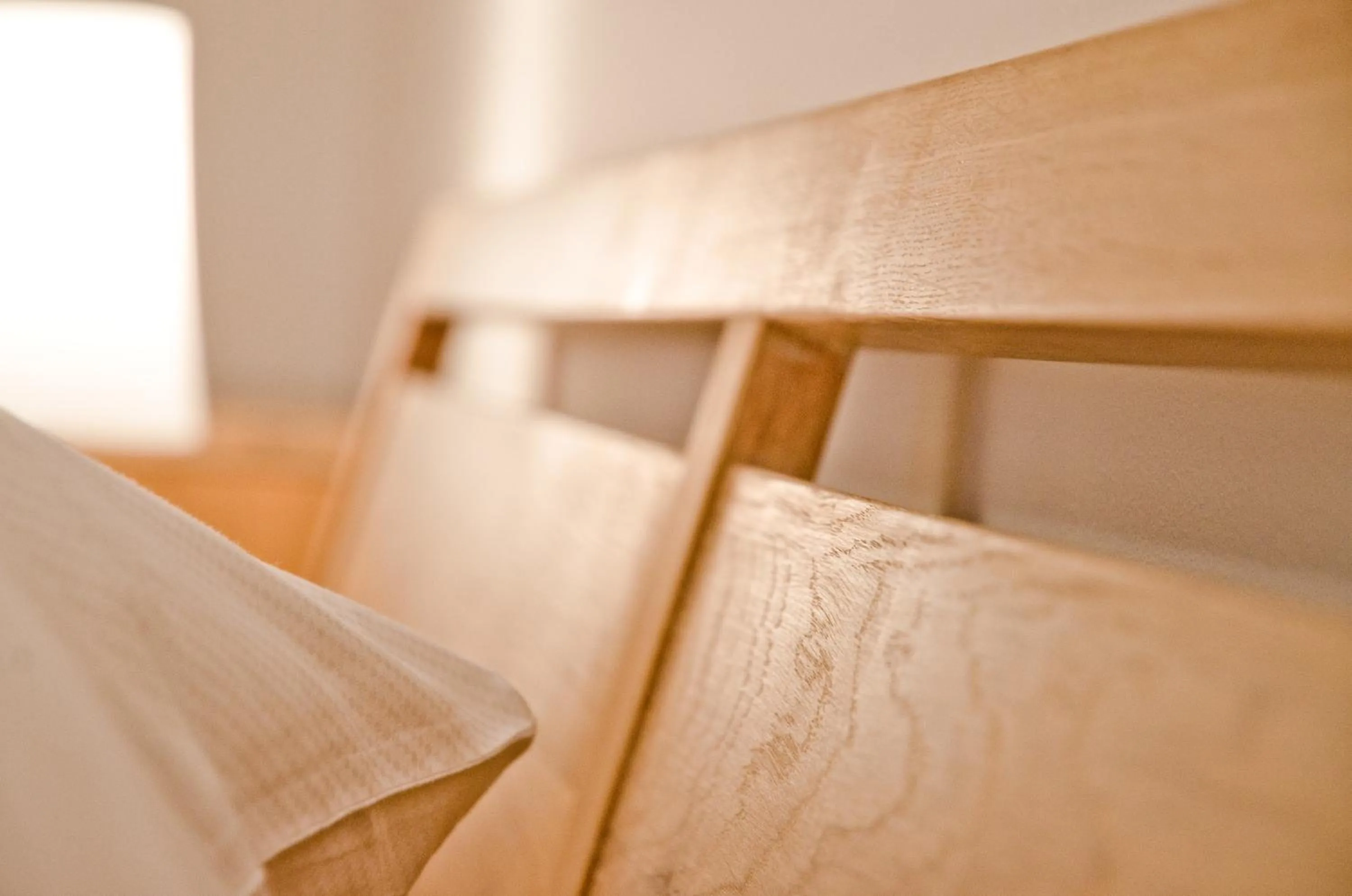 Decorative detail, Bed in Apartment Delta - GRIWA RENT AG
